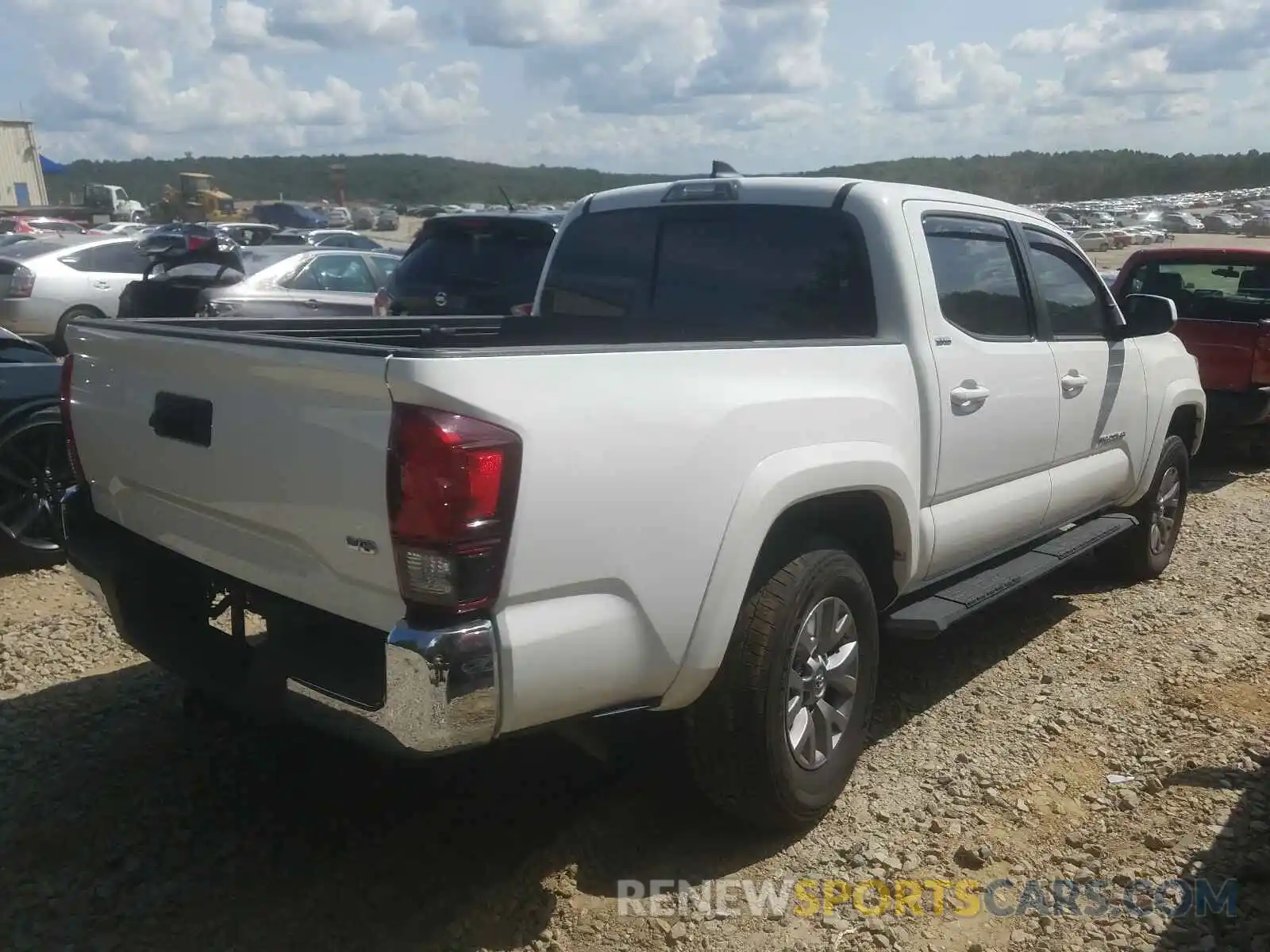 4 Photograph of a damaged car 3TMAZ5CN4KM090008 TOYOTA TACOMA 2019