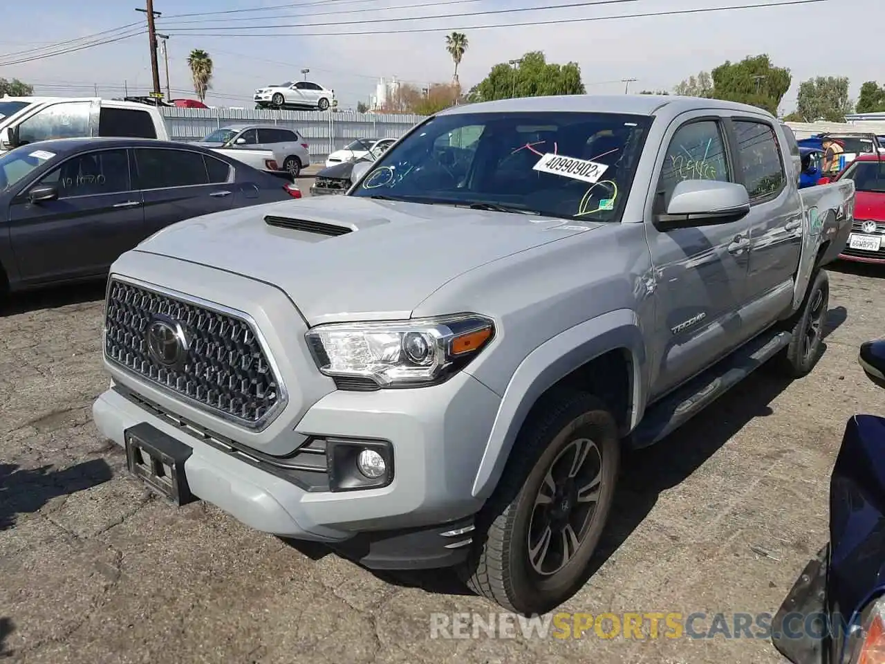 2 Photograph of a damaged car 3TMAZ5CN4KM091272 TOYOTA TACOMA 2019