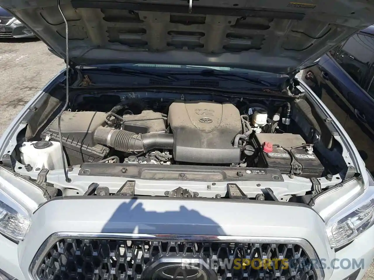 7 Photograph of a damaged car 3TMAZ5CN4KM091272 TOYOTA TACOMA 2019