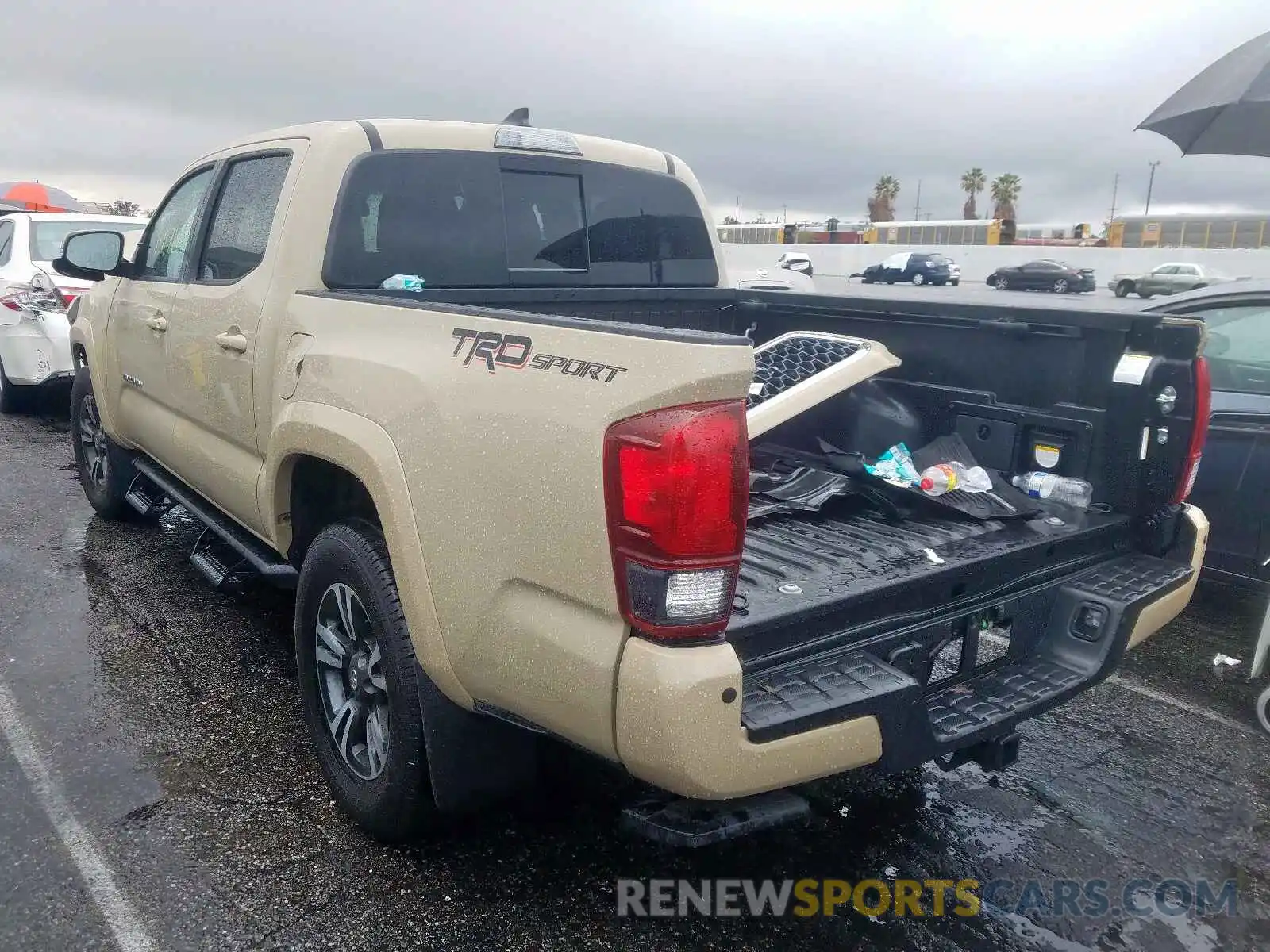 3 Photograph of a damaged car 3TMAZ5CN4KM091983 TOYOTA TACOMA 2019