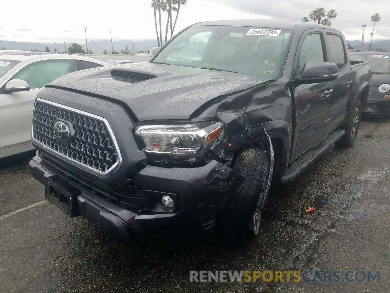 2 Photograph of a damaged car 3TMAZ5CN4KM092843 TOYOTA TACOMA 2019