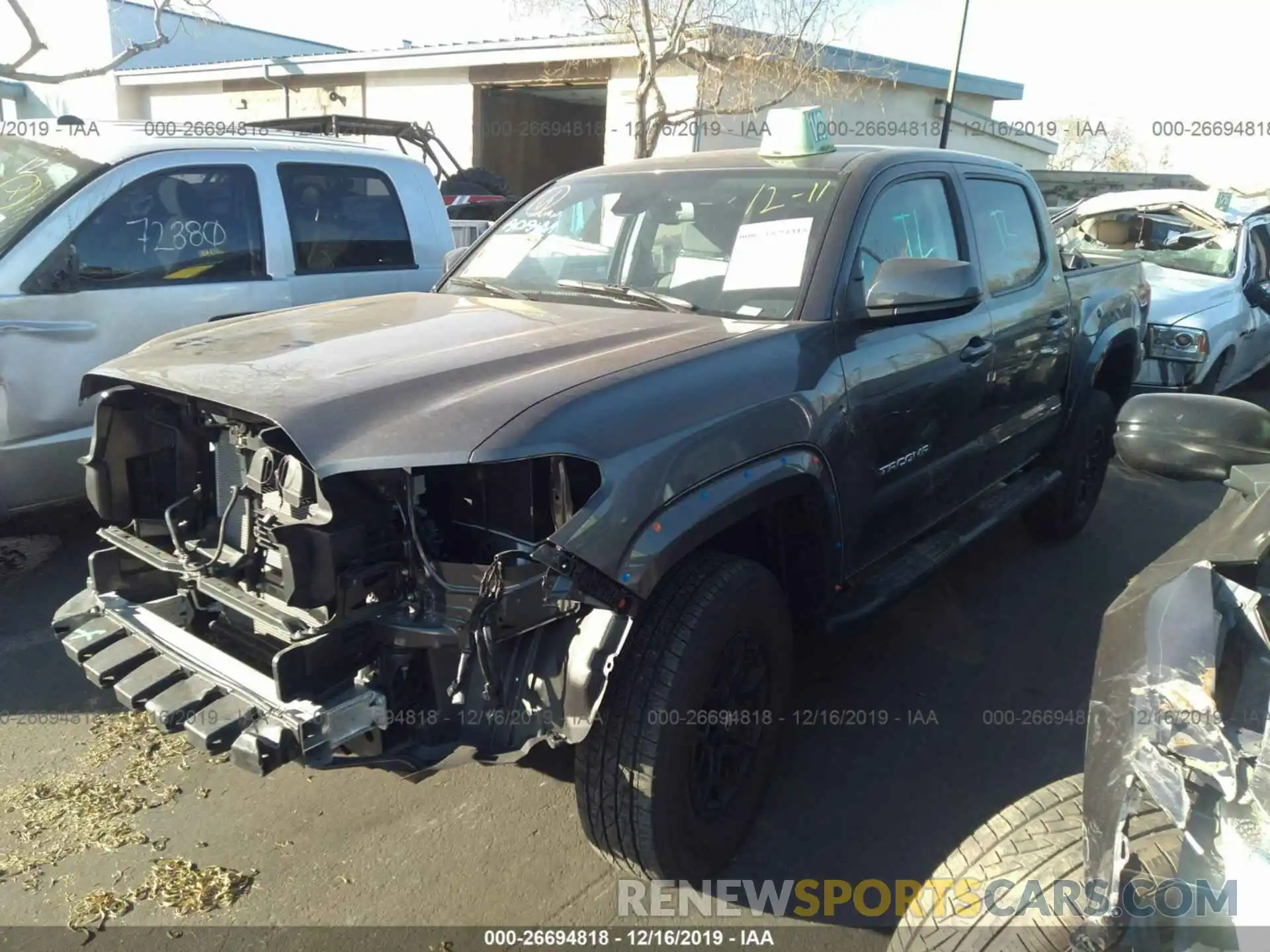 2 Photograph of a damaged car 3TMAZ5CN4KM093832 TOYOTA TACOMA 2019