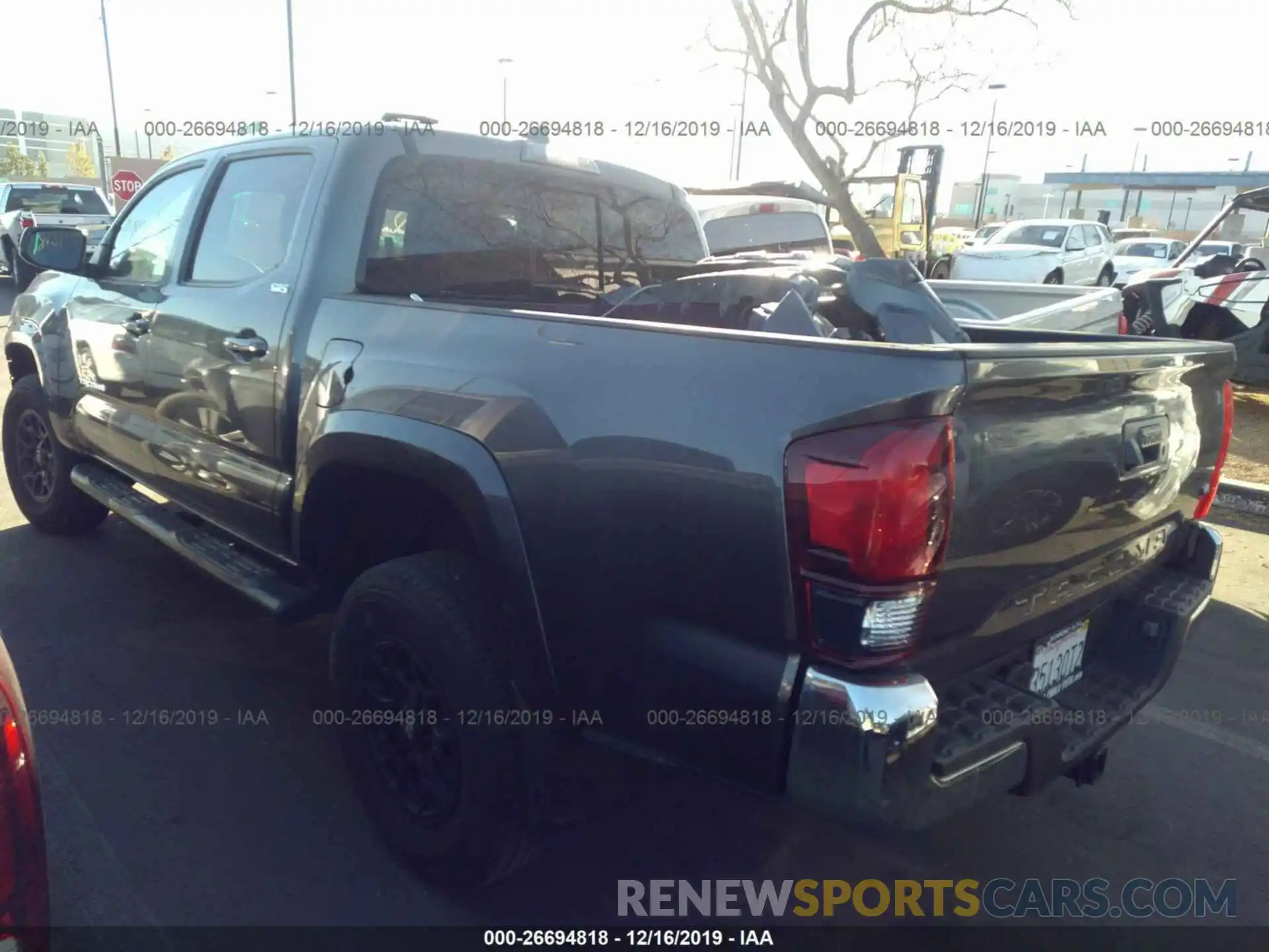 3 Photograph of a damaged car 3TMAZ5CN4KM093832 TOYOTA TACOMA 2019