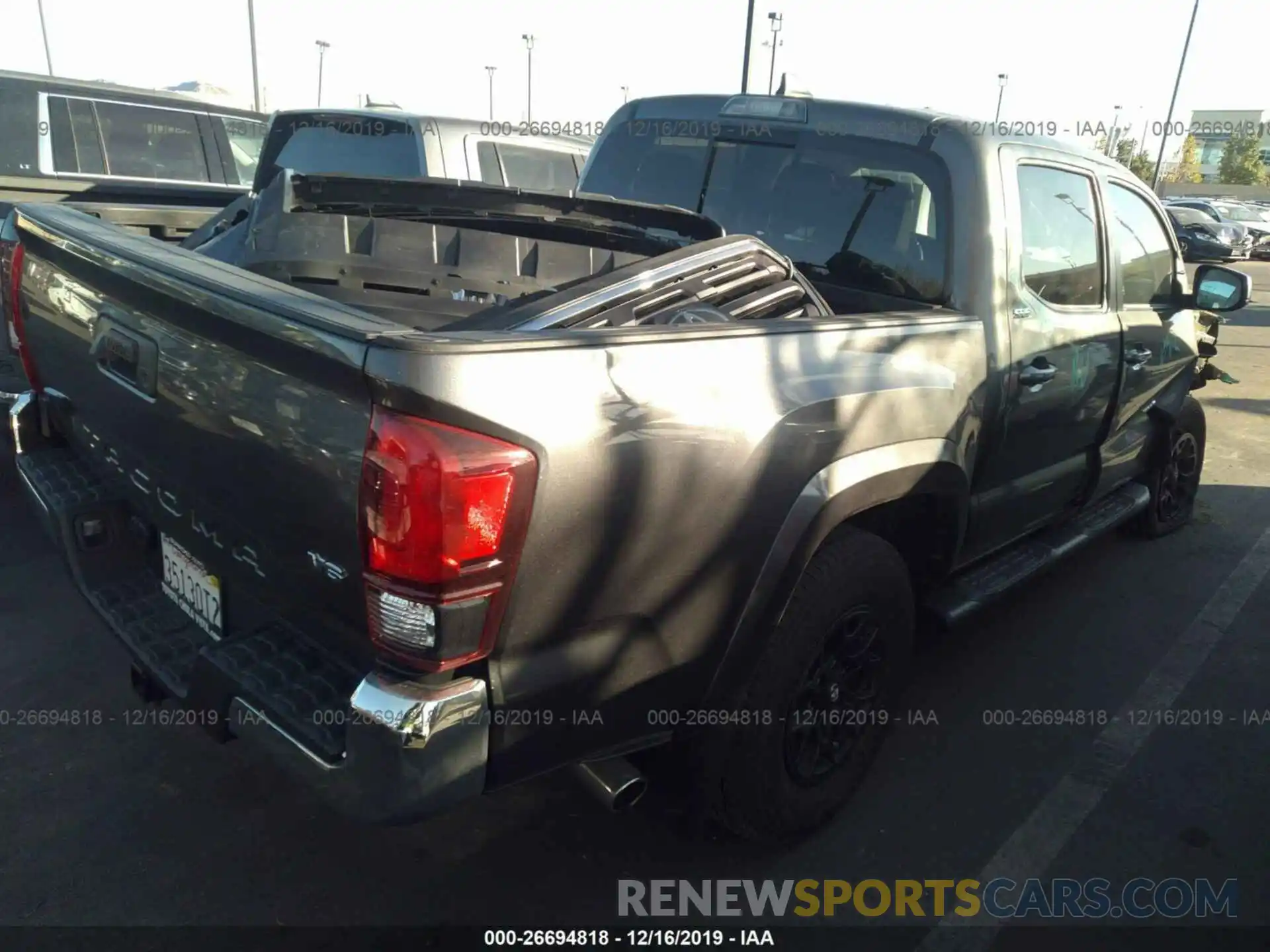 4 Photograph of a damaged car 3TMAZ5CN4KM093832 TOYOTA TACOMA 2019