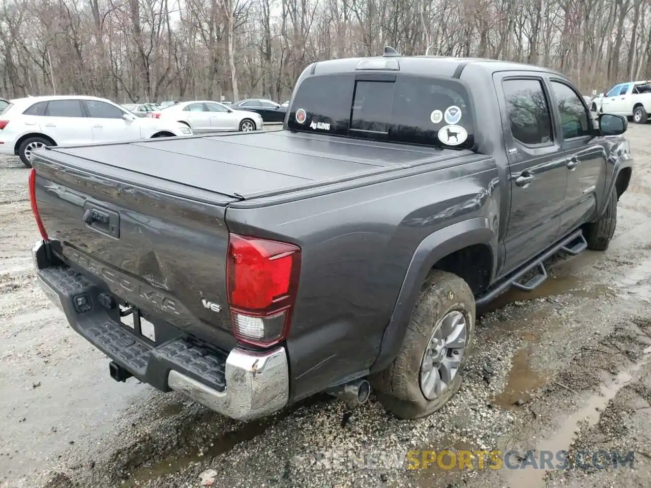 4 Photograph of a damaged car 3TMAZ5CN4KM096486 TOYOTA TACOMA 2019