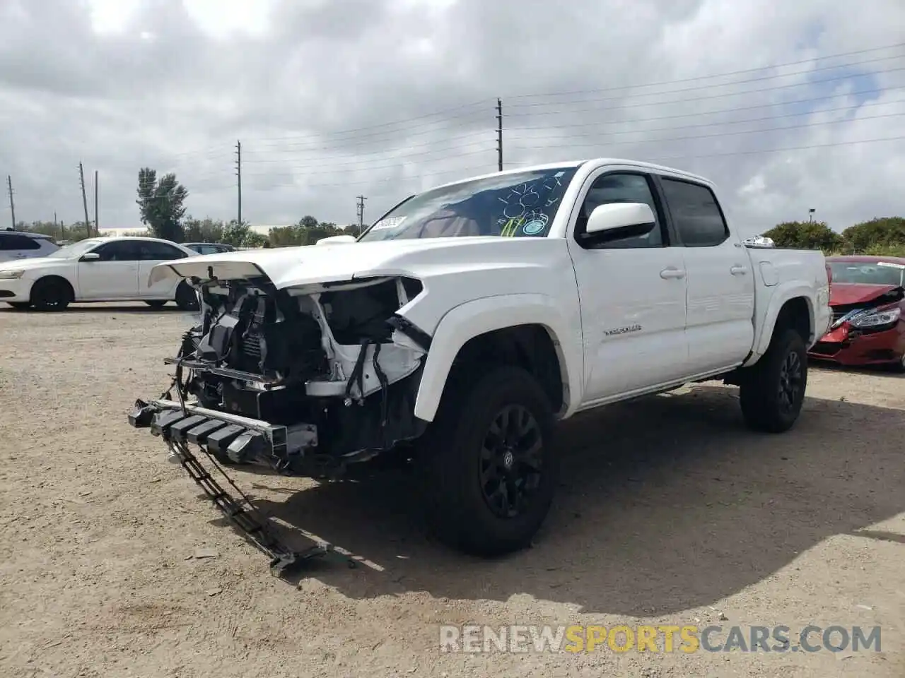 2 Photograph of a damaged car 3TMAZ5CN4KM100097 TOYOTA TACOMA 2019