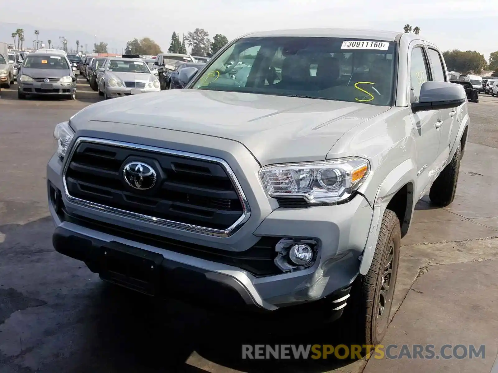 2 Photograph of a damaged car 3TMAZ5CN4KM102710 TOYOTA TACOMA 2019