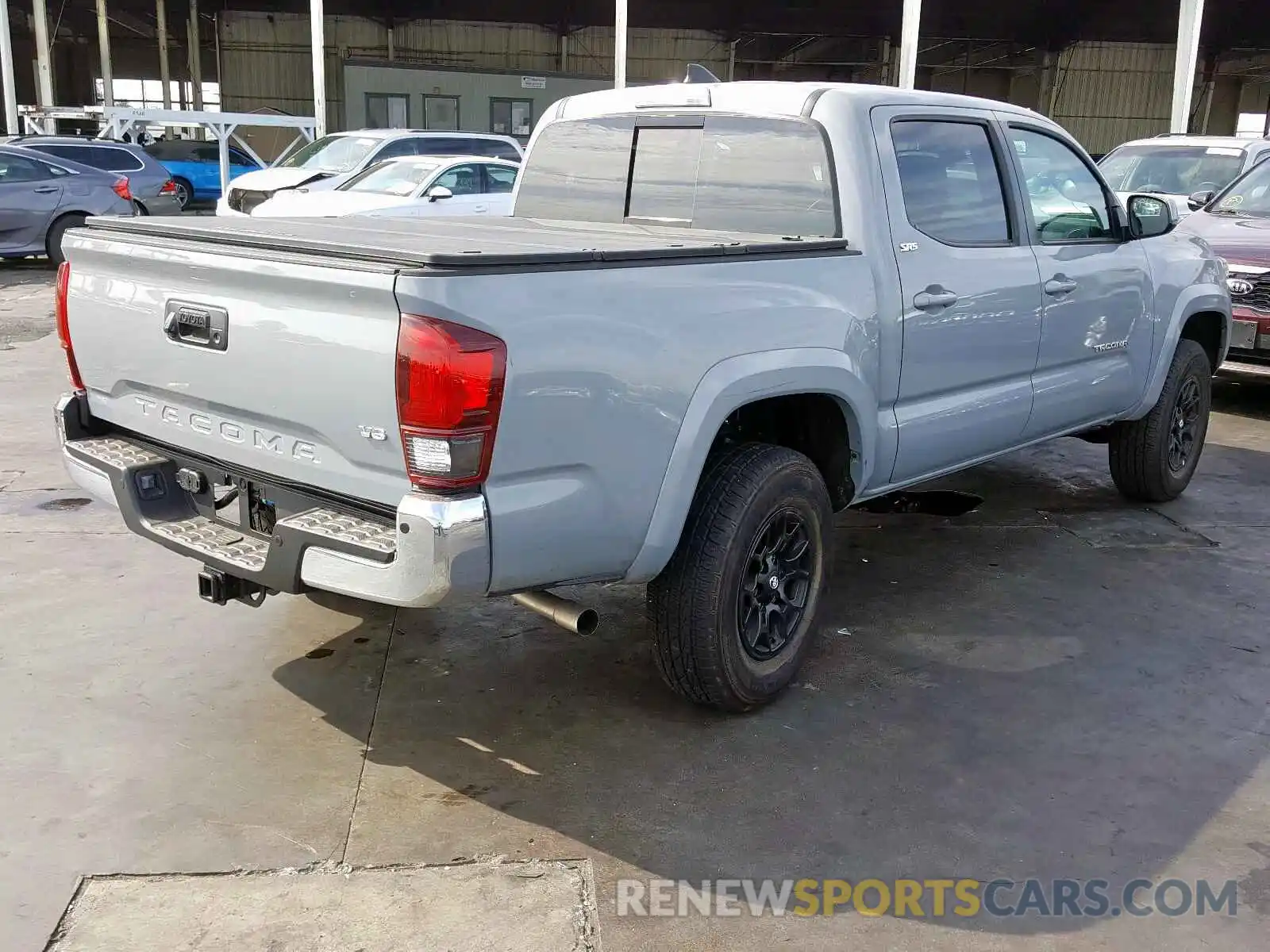 4 Photograph of a damaged car 3TMAZ5CN4KM102710 TOYOTA TACOMA 2019