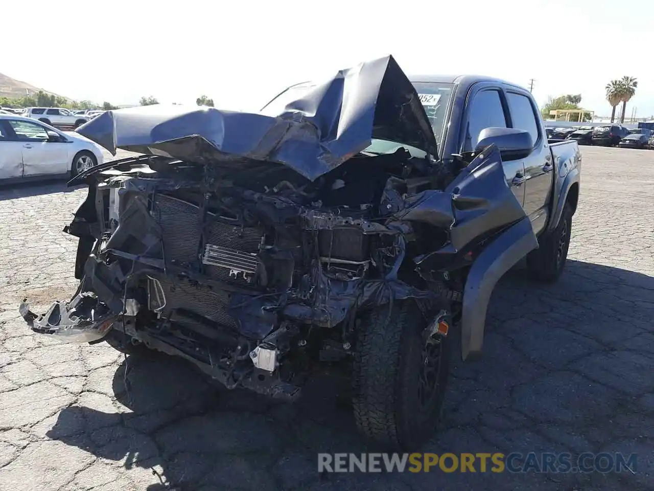 2 Photograph of a damaged car 3TMAZ5CN4KM104764 TOYOTA TACOMA 2019