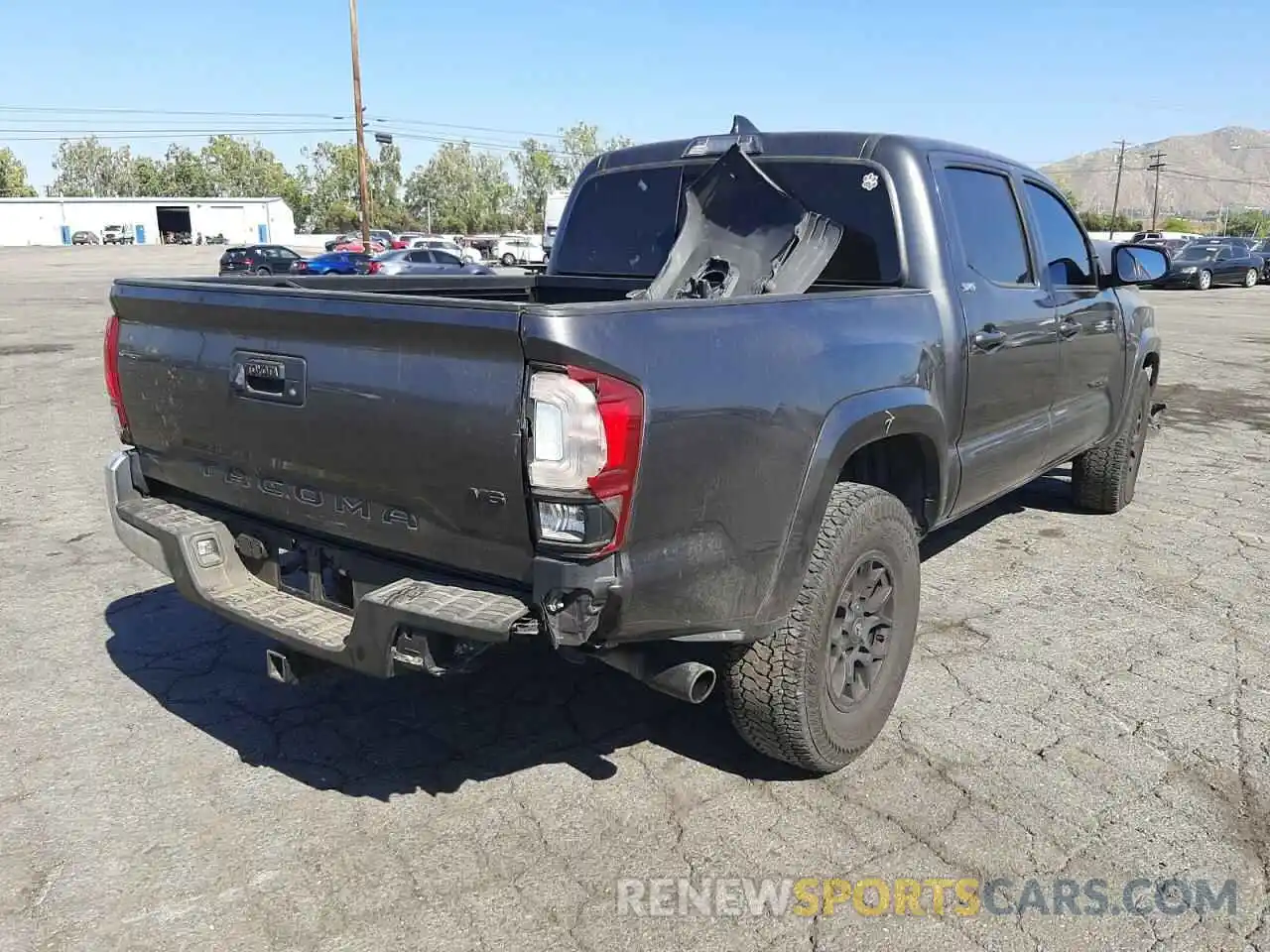 4 Photograph of a damaged car 3TMAZ5CN4KM104764 TOYOTA TACOMA 2019