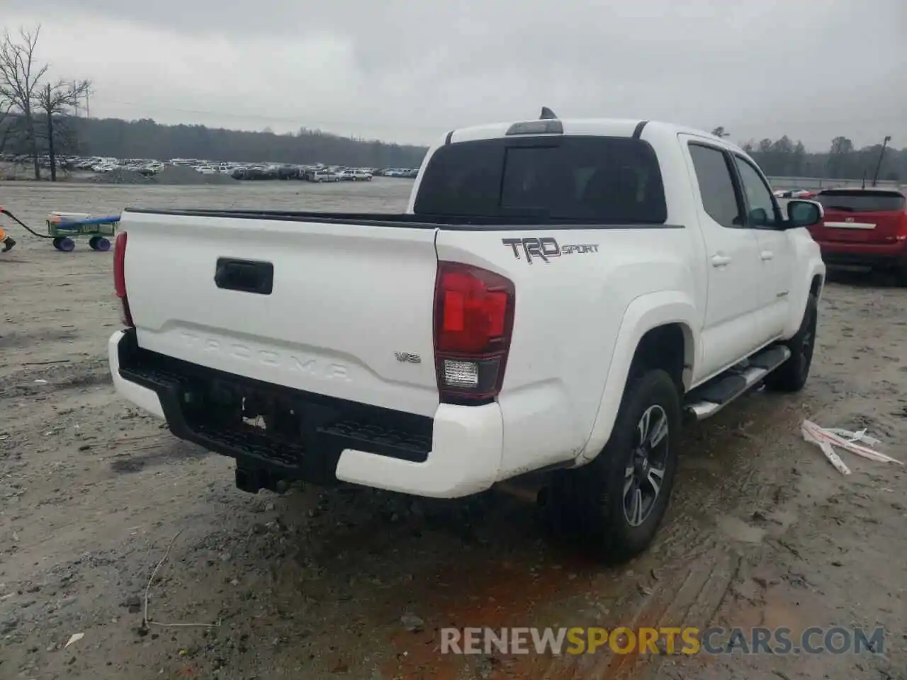 4 Photograph of a damaged car 3TMAZ5CN4KM105722 TOYOTA TACOMA 2019