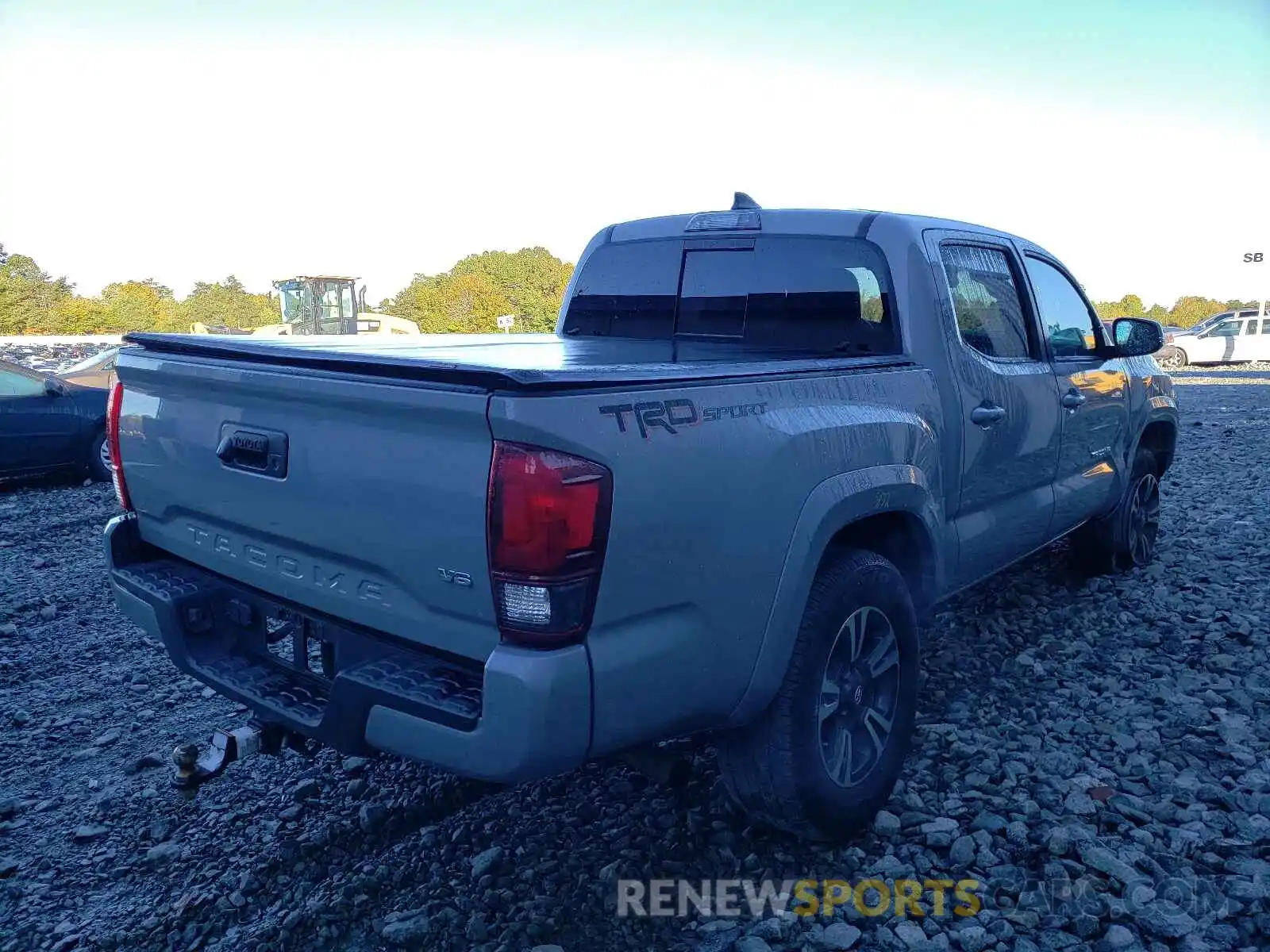 4 Photograph of a damaged car 3TMAZ5CN4KM106482 TOYOTA TACOMA 2019