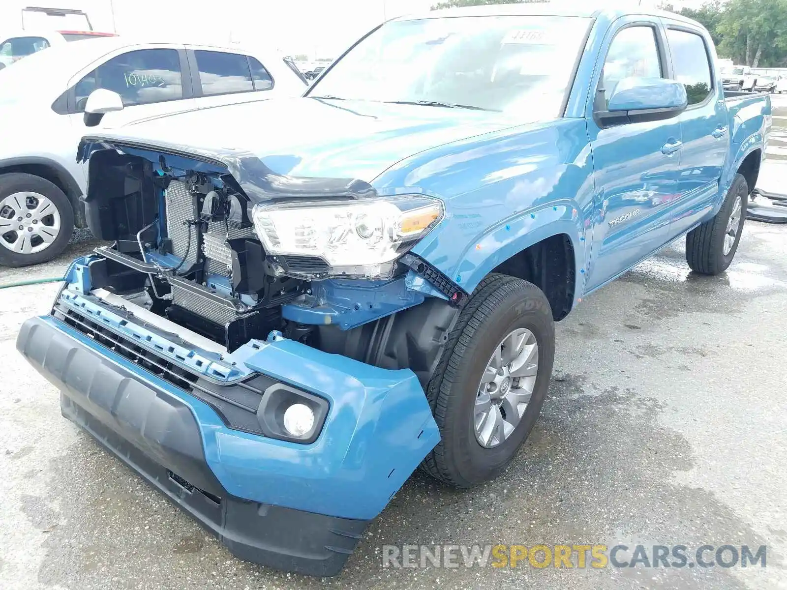 2 Photograph of a damaged car 3TMAZ5CN4KM108197 TOYOTA TACOMA 2019