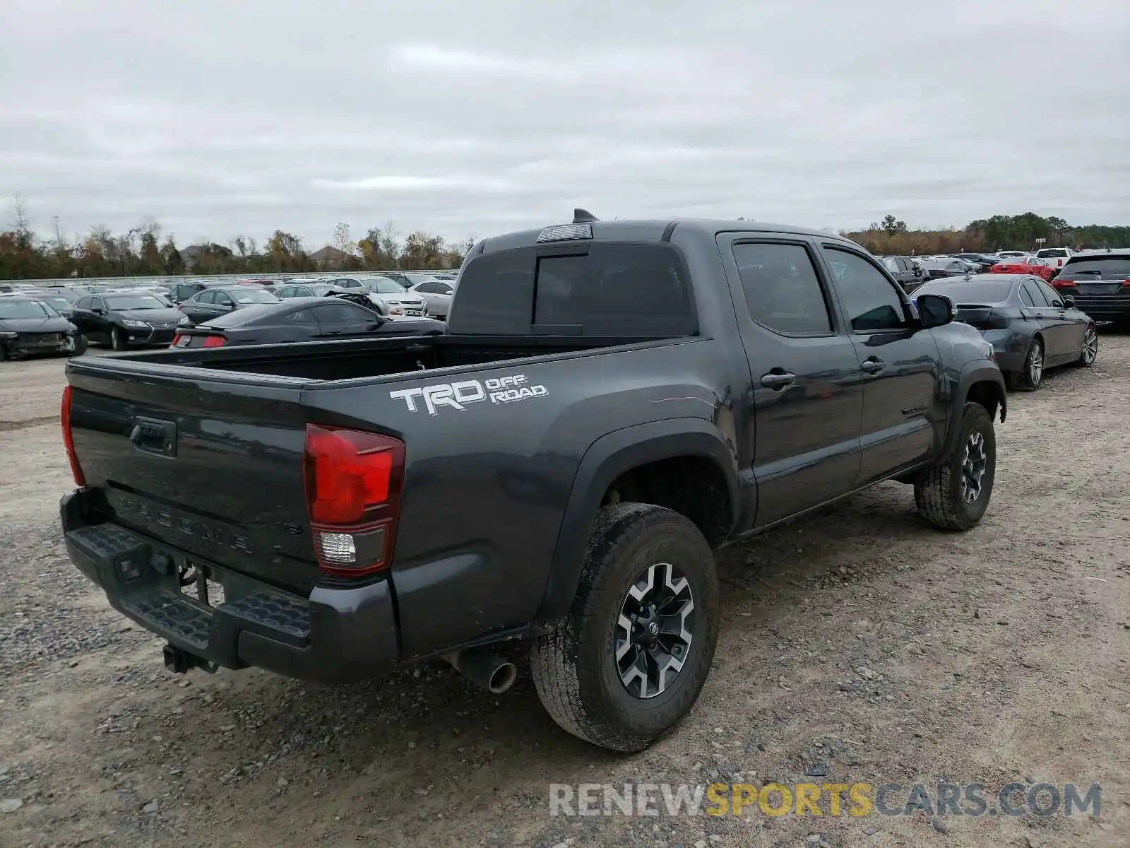 4 Photograph of a damaged car 3TMAZ5CN4KM113643 TOYOTA TACOMA 2019