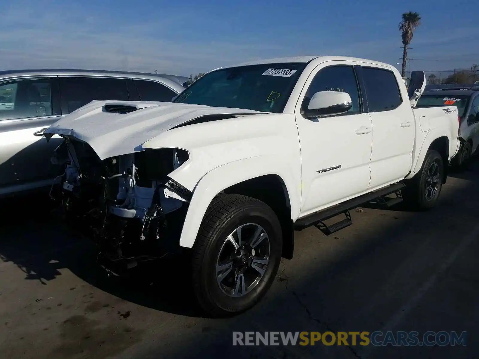 2 Photograph of a damaged car 3TMAZ5CN5KM081317 TOYOTA TACOMA 2019