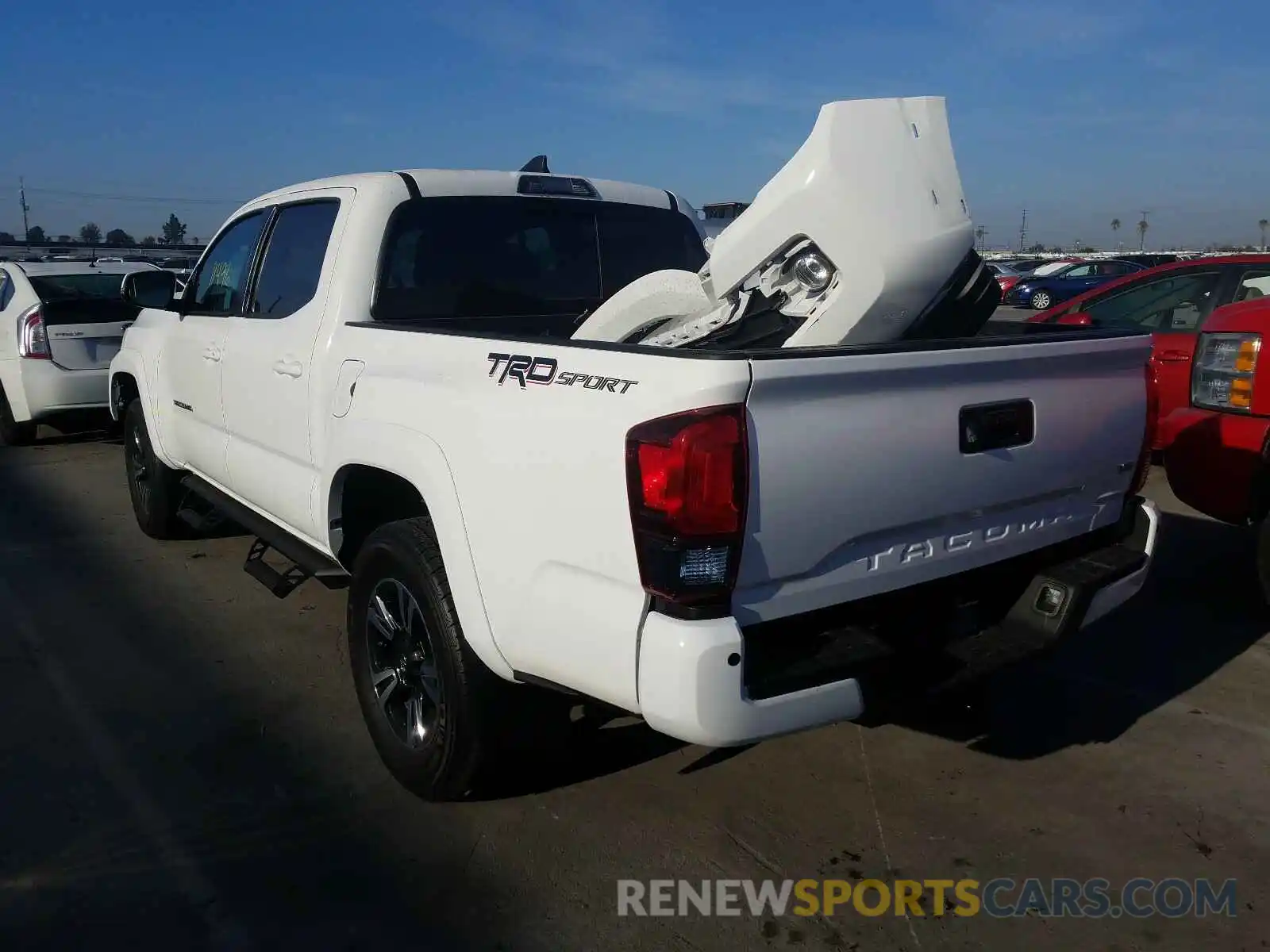 3 Photograph of a damaged car 3TMAZ5CN5KM081317 TOYOTA TACOMA 2019