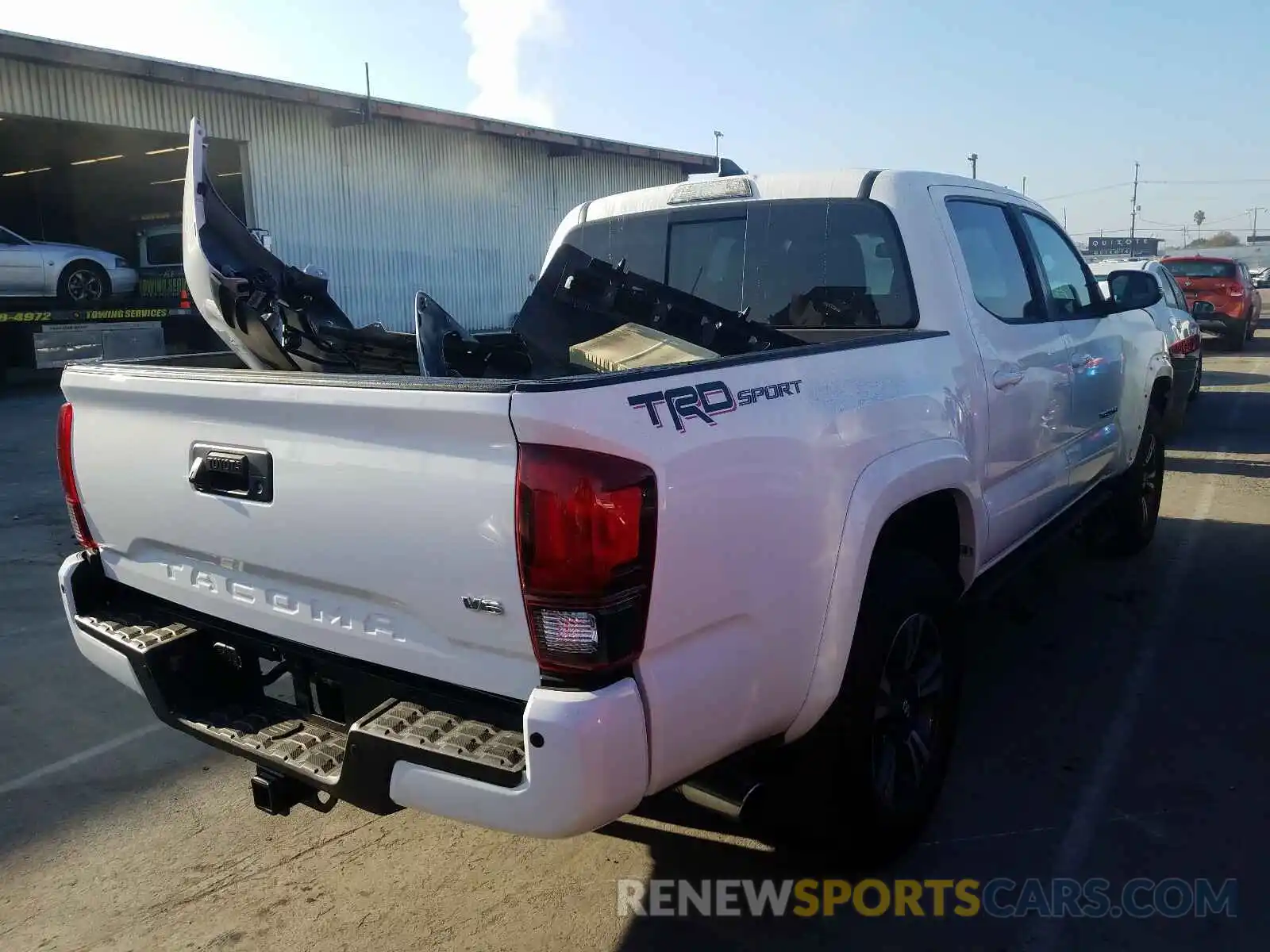 4 Photograph of a damaged car 3TMAZ5CN5KM081317 TOYOTA TACOMA 2019