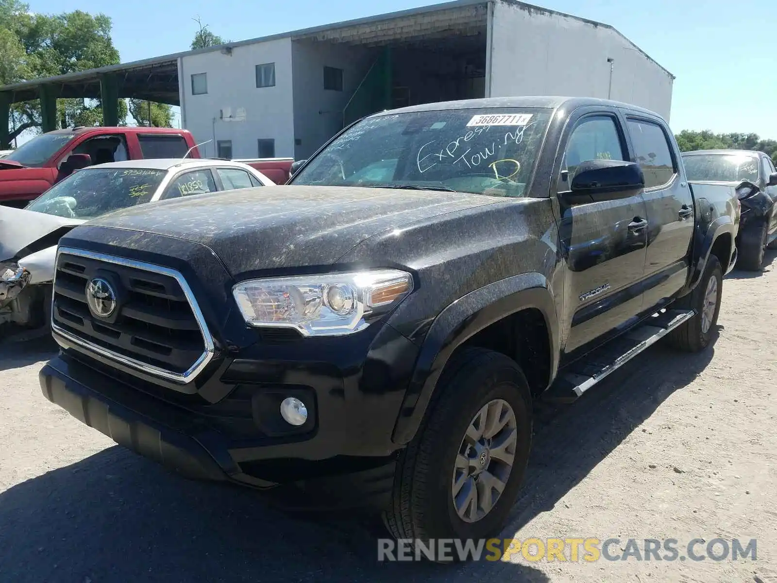 2 Photograph of a damaged car 3TMAZ5CN5KM083603 TOYOTA TACOMA 2019