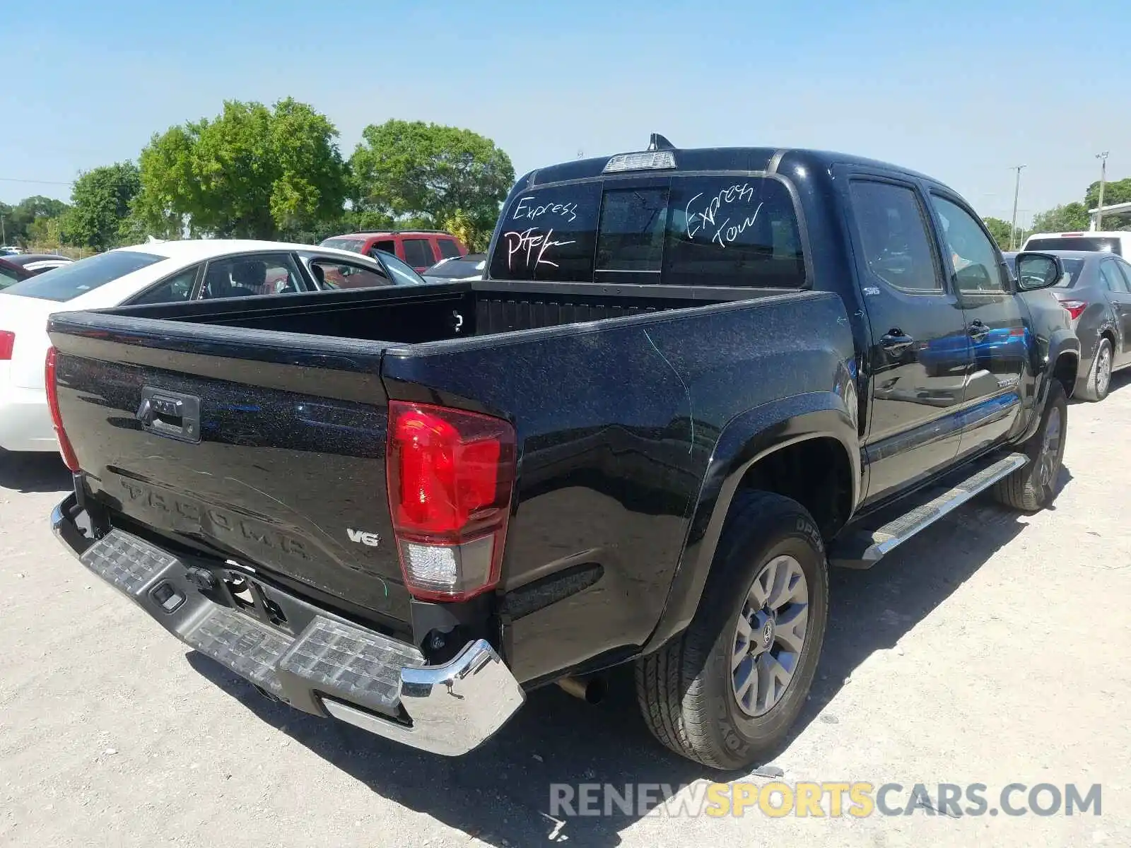 4 Photograph of a damaged car 3TMAZ5CN5KM083603 TOYOTA TACOMA 2019