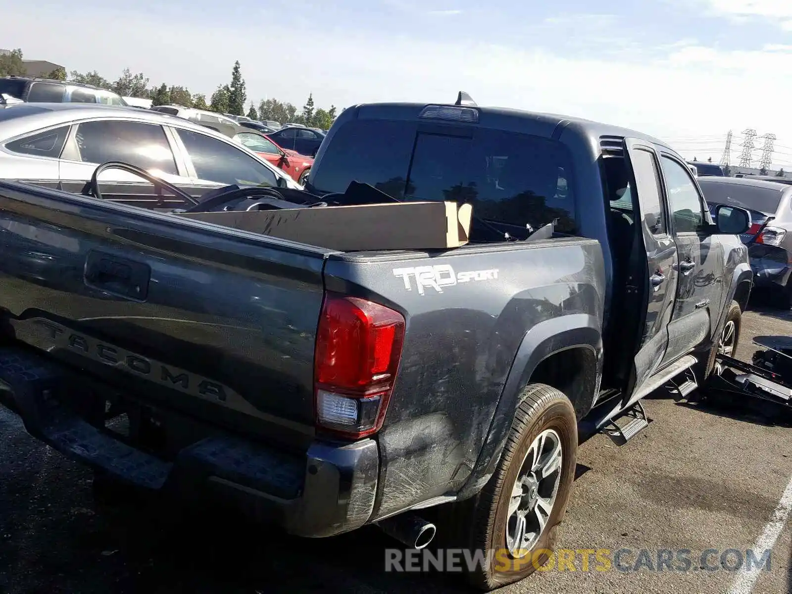 4 Photograph of a damaged car 3TMAZ5CN5KM084766 TOYOTA TACOMA 2019