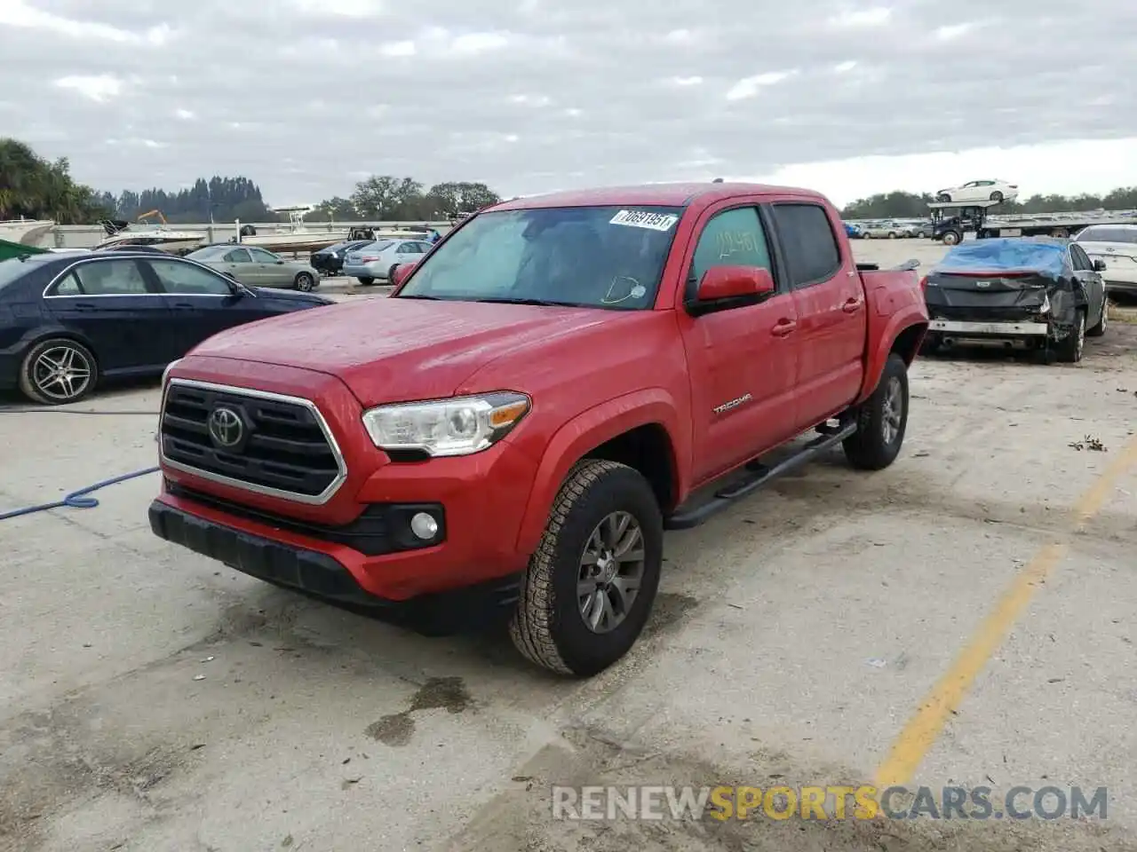 2 Photograph of a damaged car 3TMAZ5CN5KM087523 TOYOTA TACOMA 2019