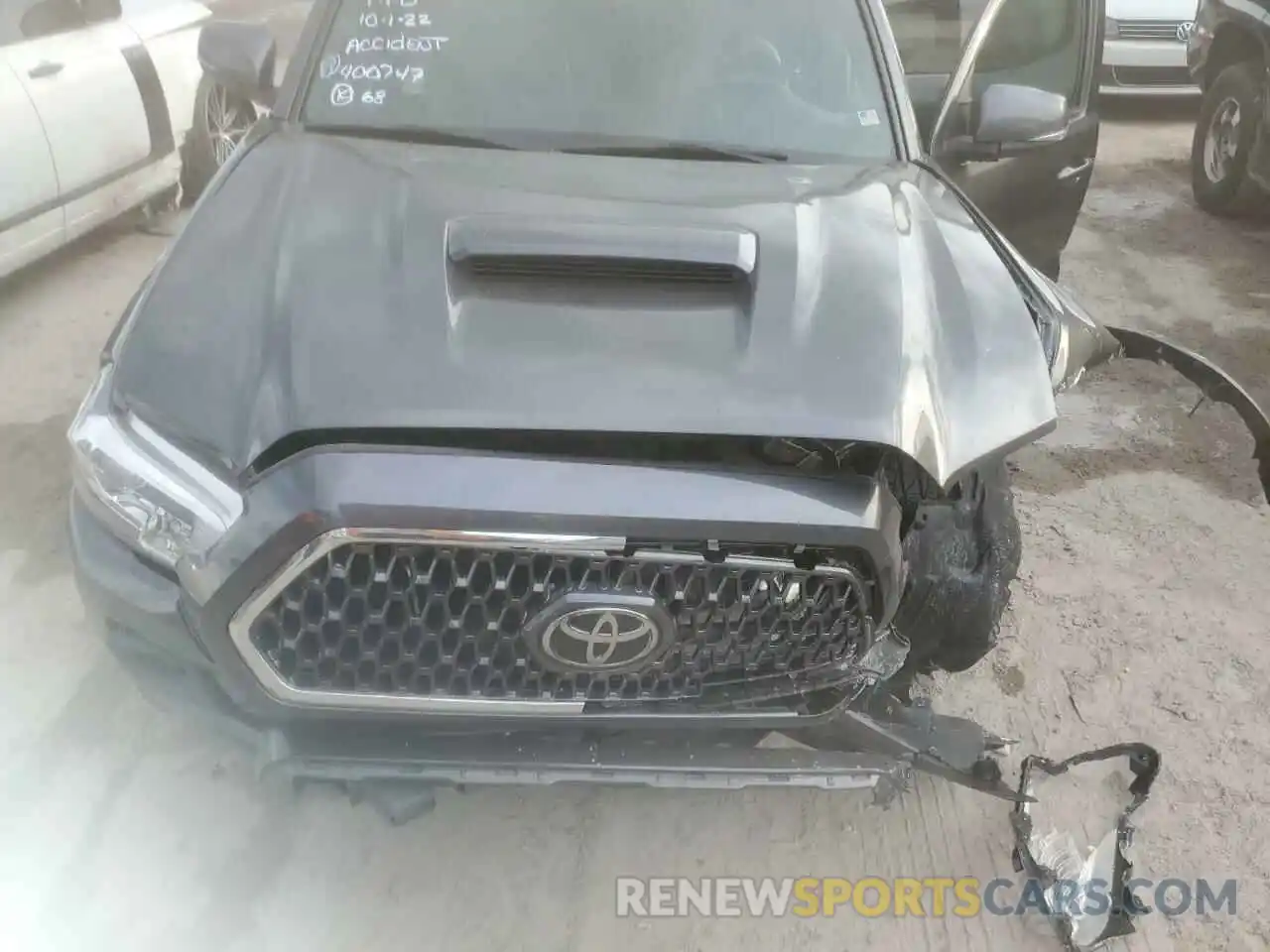 7 Photograph of a damaged car 3TMAZ5CN5KM089577 TOYOTA TACOMA 2019