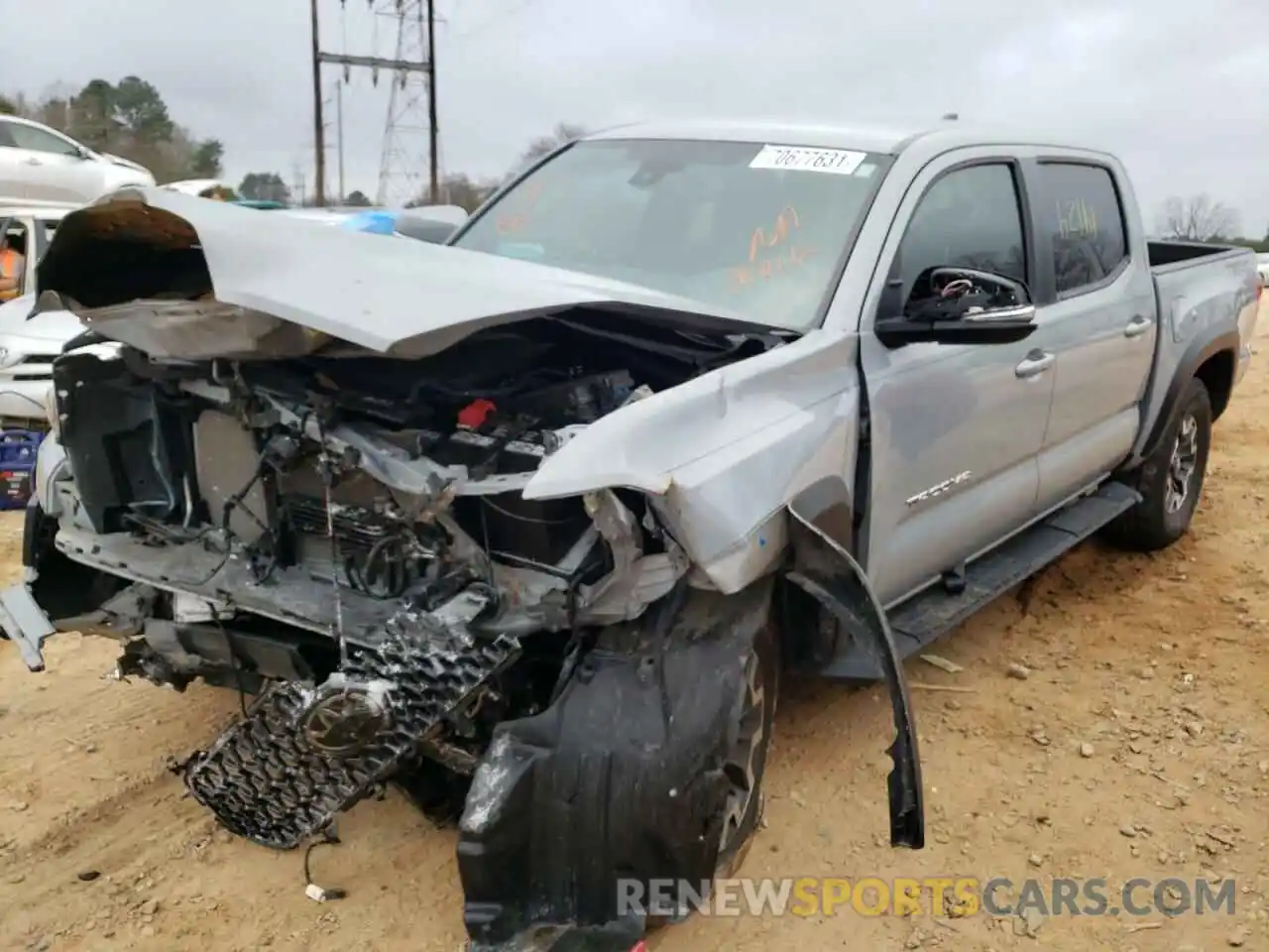 2 Photograph of a damaged car 3TMAZ5CN5KM090034 TOYOTA TACOMA 2019