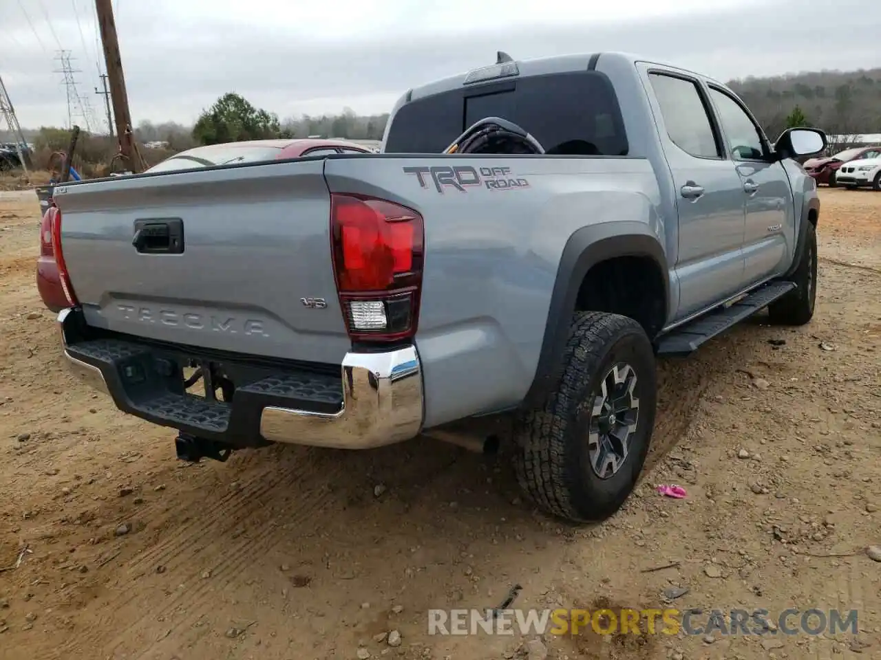 4 Photograph of a damaged car 3TMAZ5CN5KM090034 TOYOTA TACOMA 2019