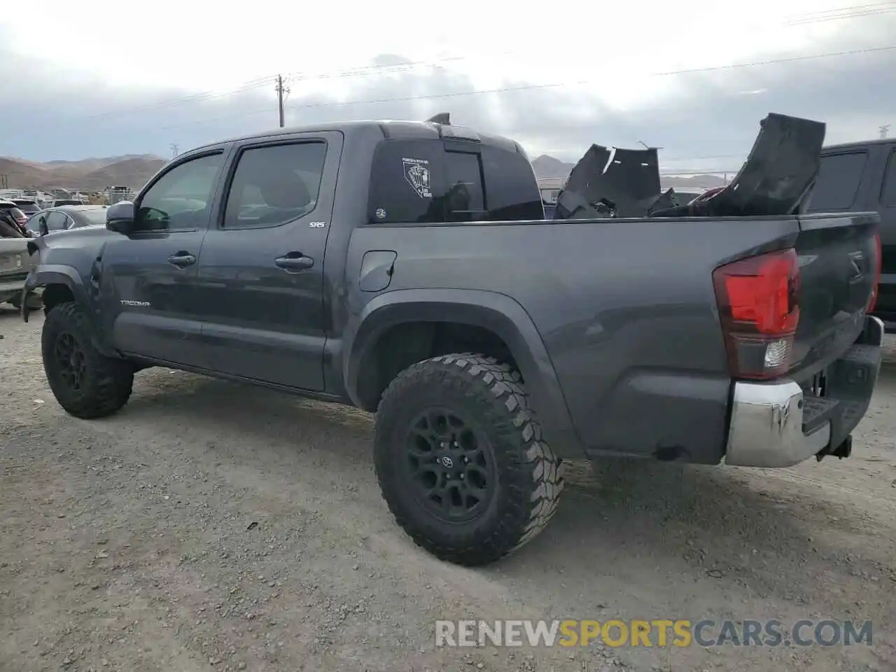 2 Photograph of a damaged car 3TMAZ5CN5KM090616 TOYOTA TACOMA 2019