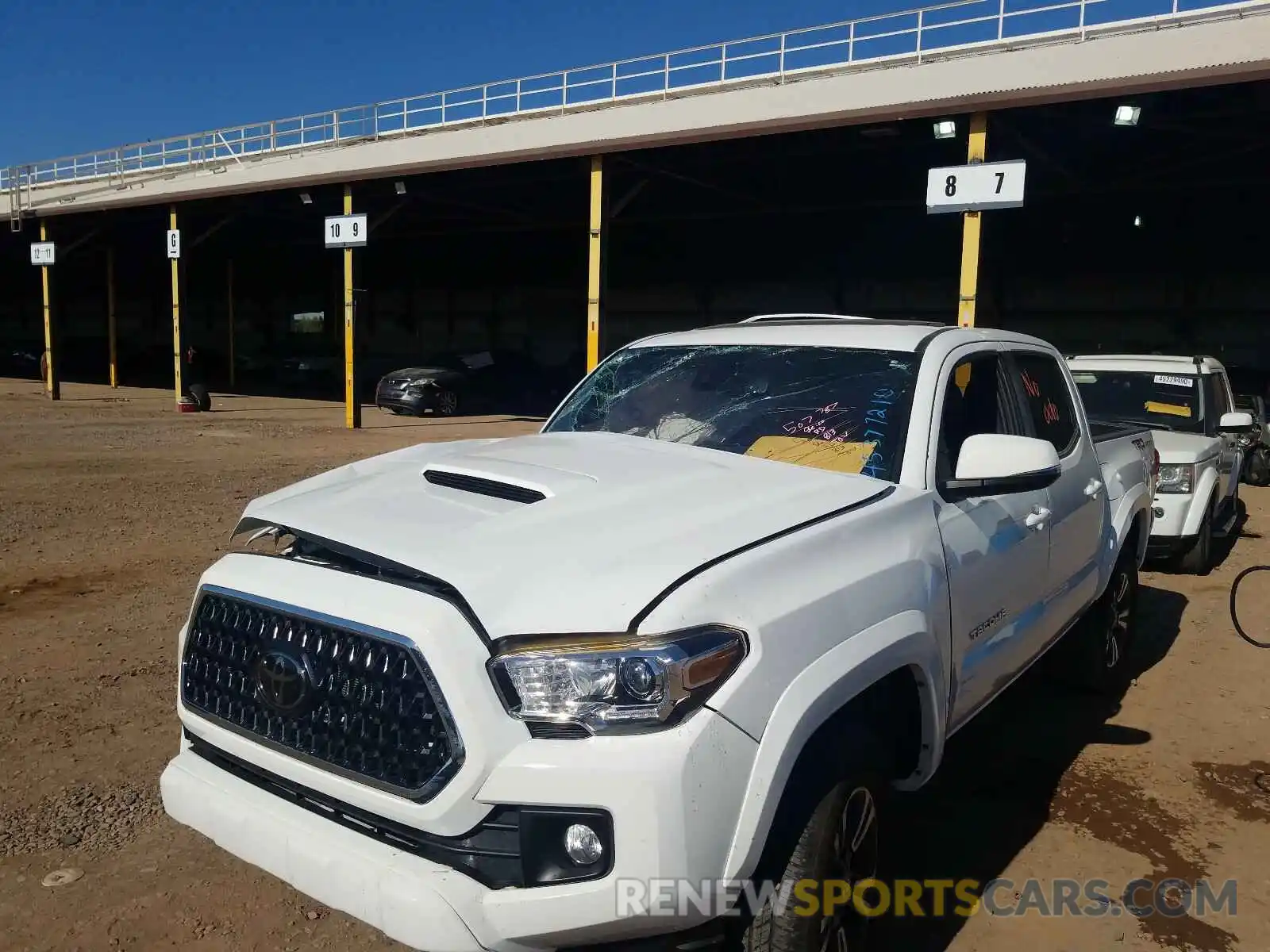 2 Photograph of a damaged car 3TMAZ5CN5KM091281 TOYOTA TACOMA 2019