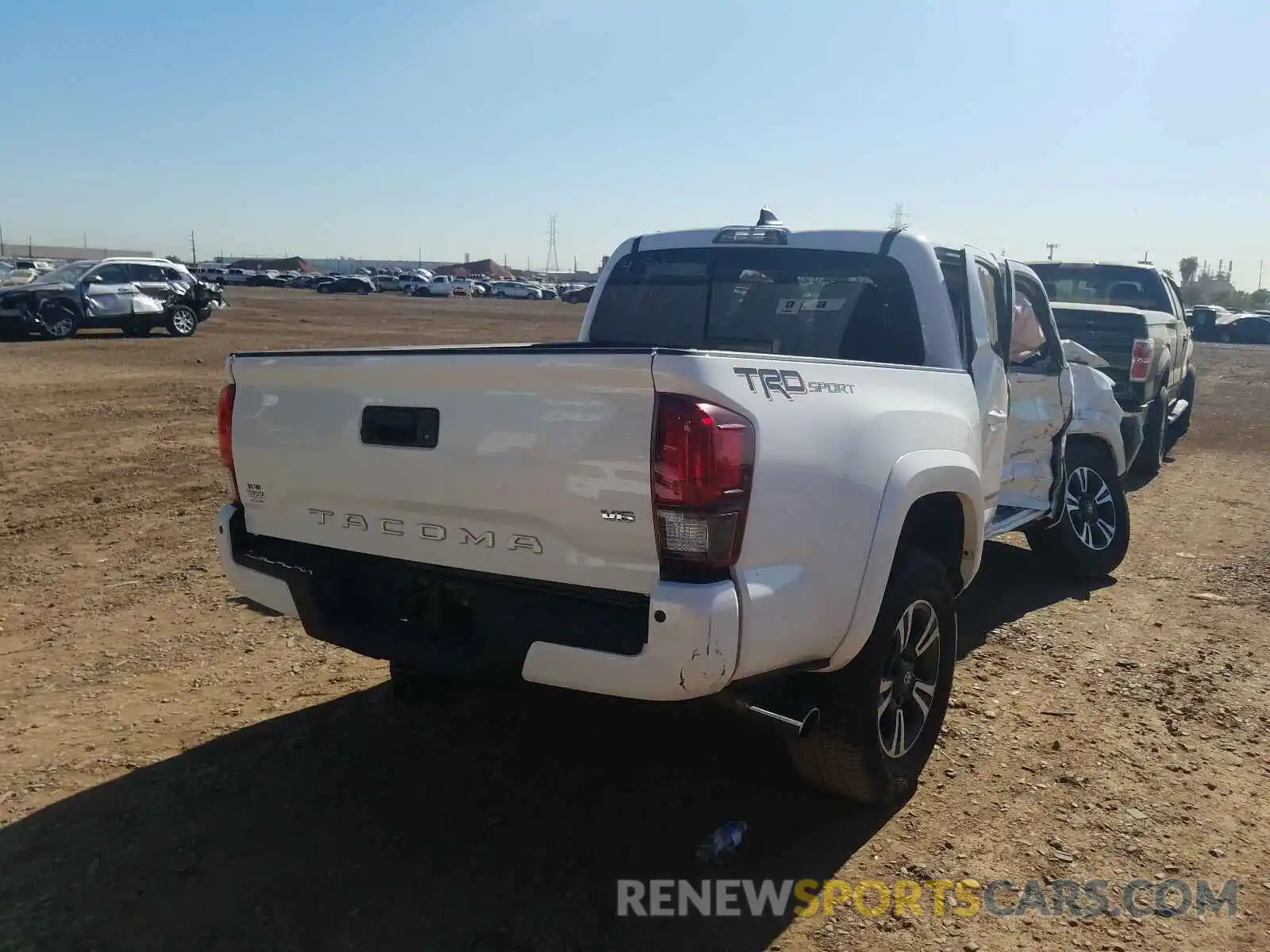 4 Photograph of a damaged car 3TMAZ5CN5KM091281 TOYOTA TACOMA 2019