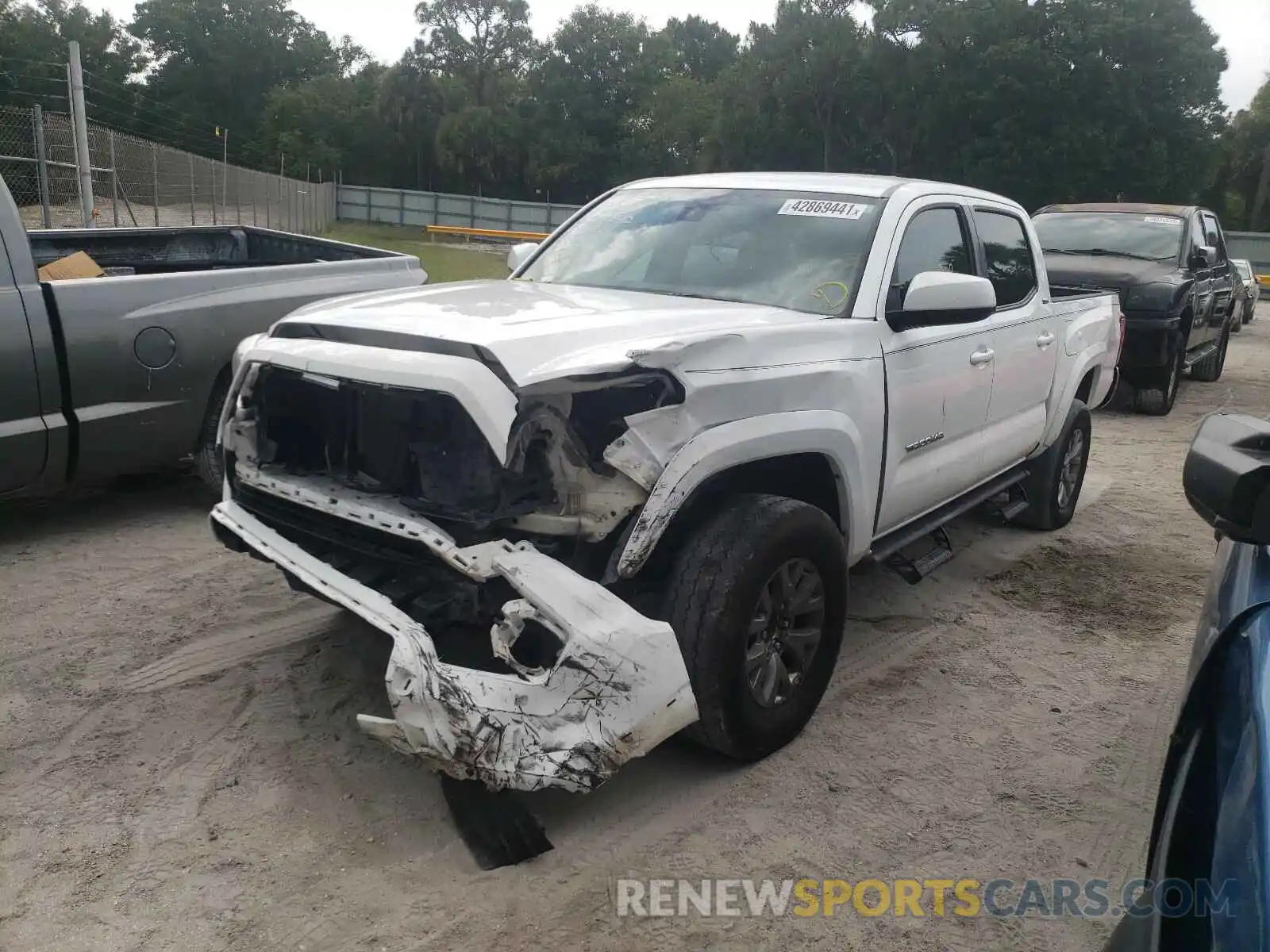 2 Photograph of a damaged car 3TMAZ5CN5KM093788 TOYOTA TACOMA 2019