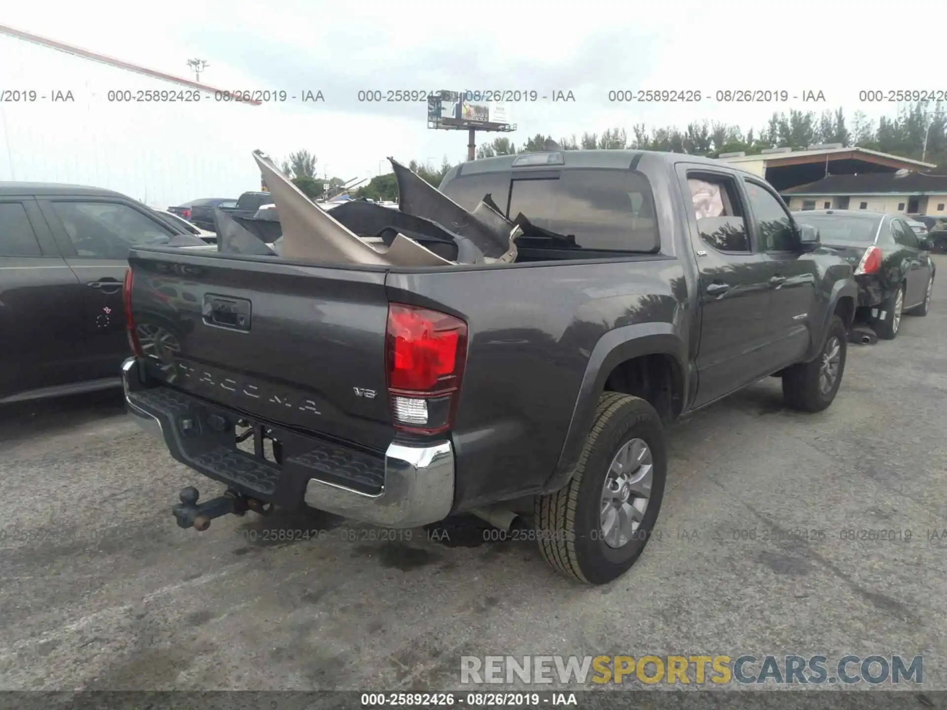 4 Photograph of a damaged car 3TMAZ5CN5KM094164 TOYOTA TACOMA 2019