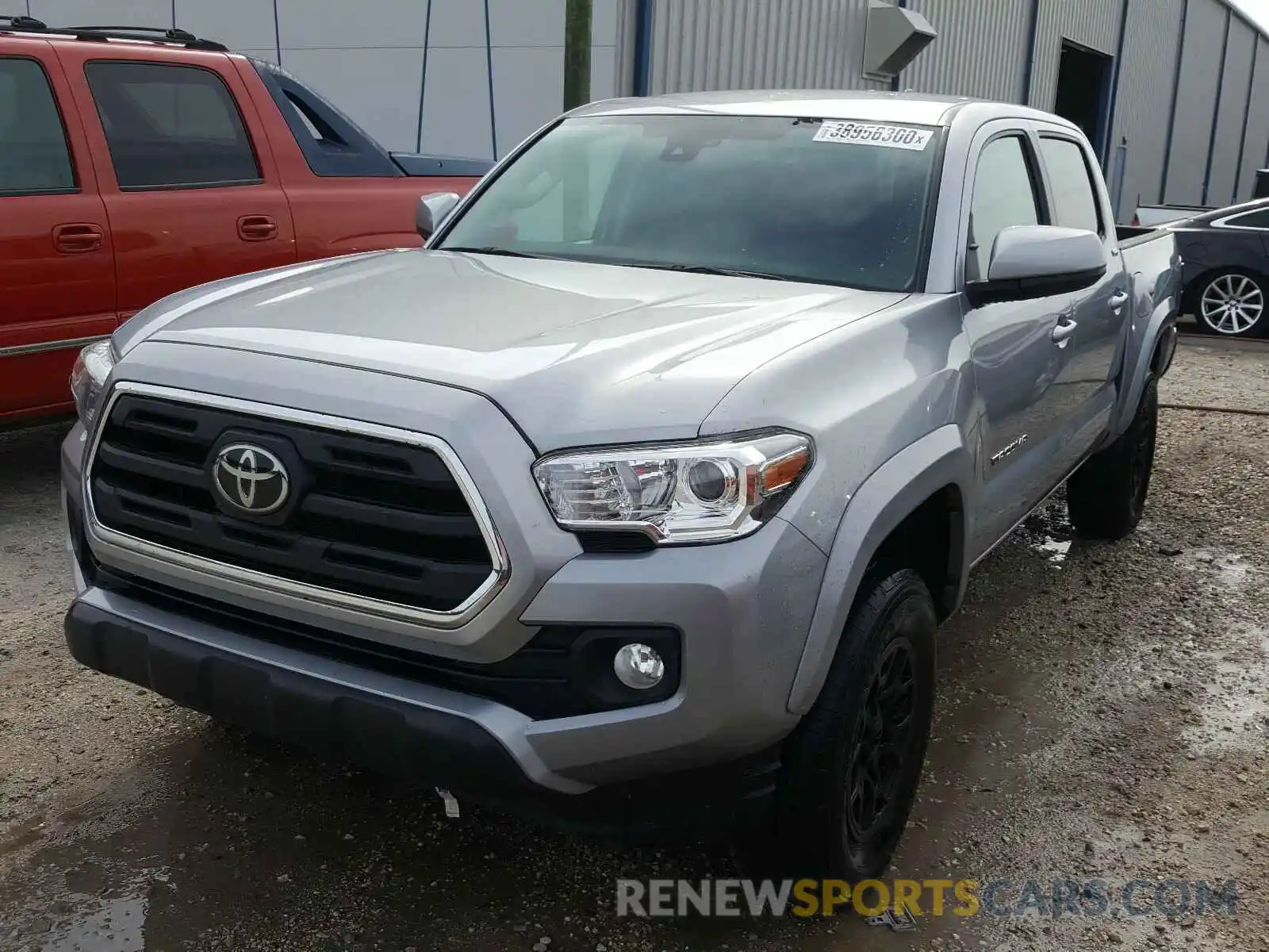 2 Photograph of a damaged car 3TMAZ5CN5KM096612 TOYOTA TACOMA 2019