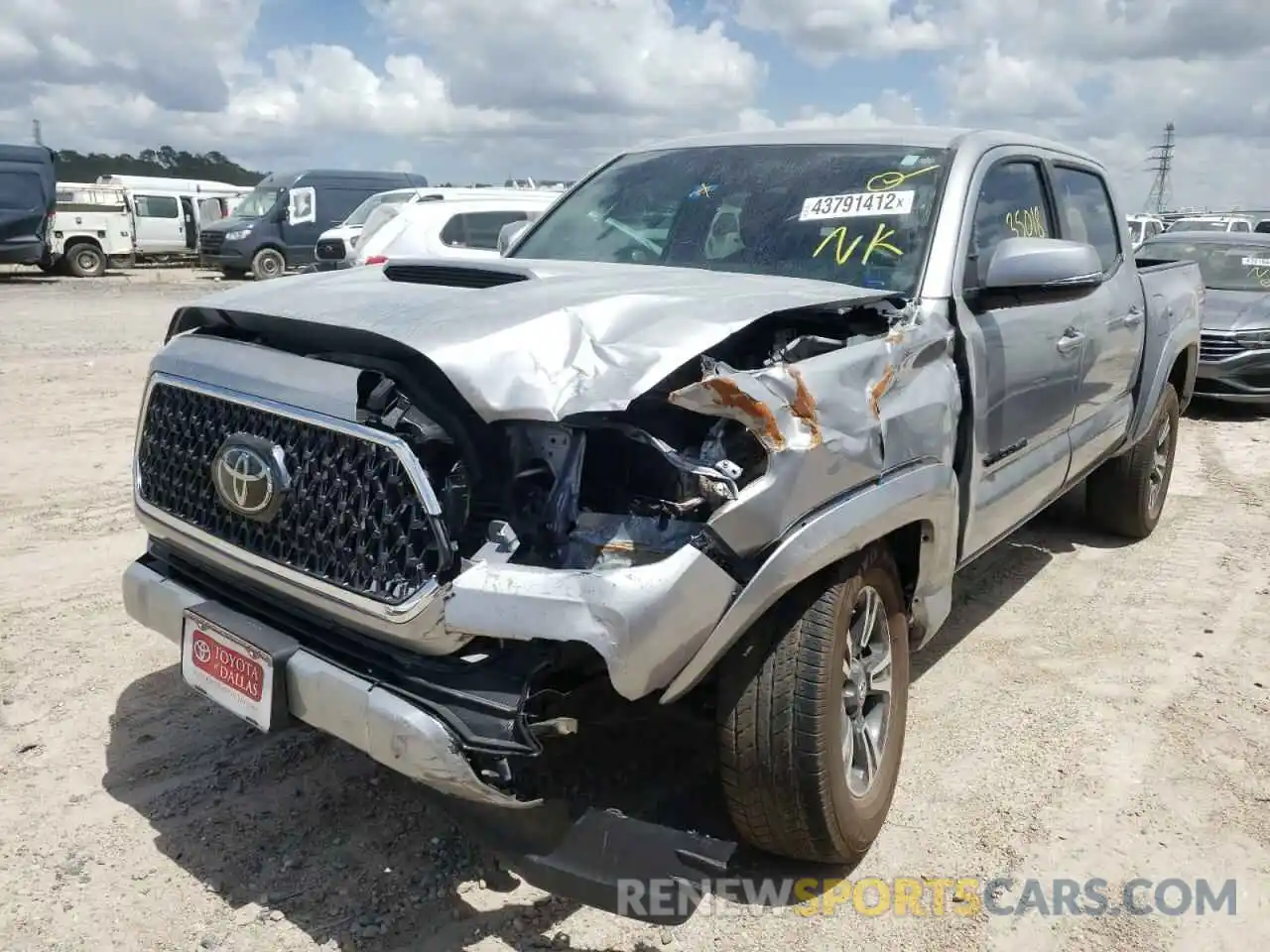 2 Photograph of a damaged car 3TMAZ5CN5KM097517 TOYOTA TACOMA 2019