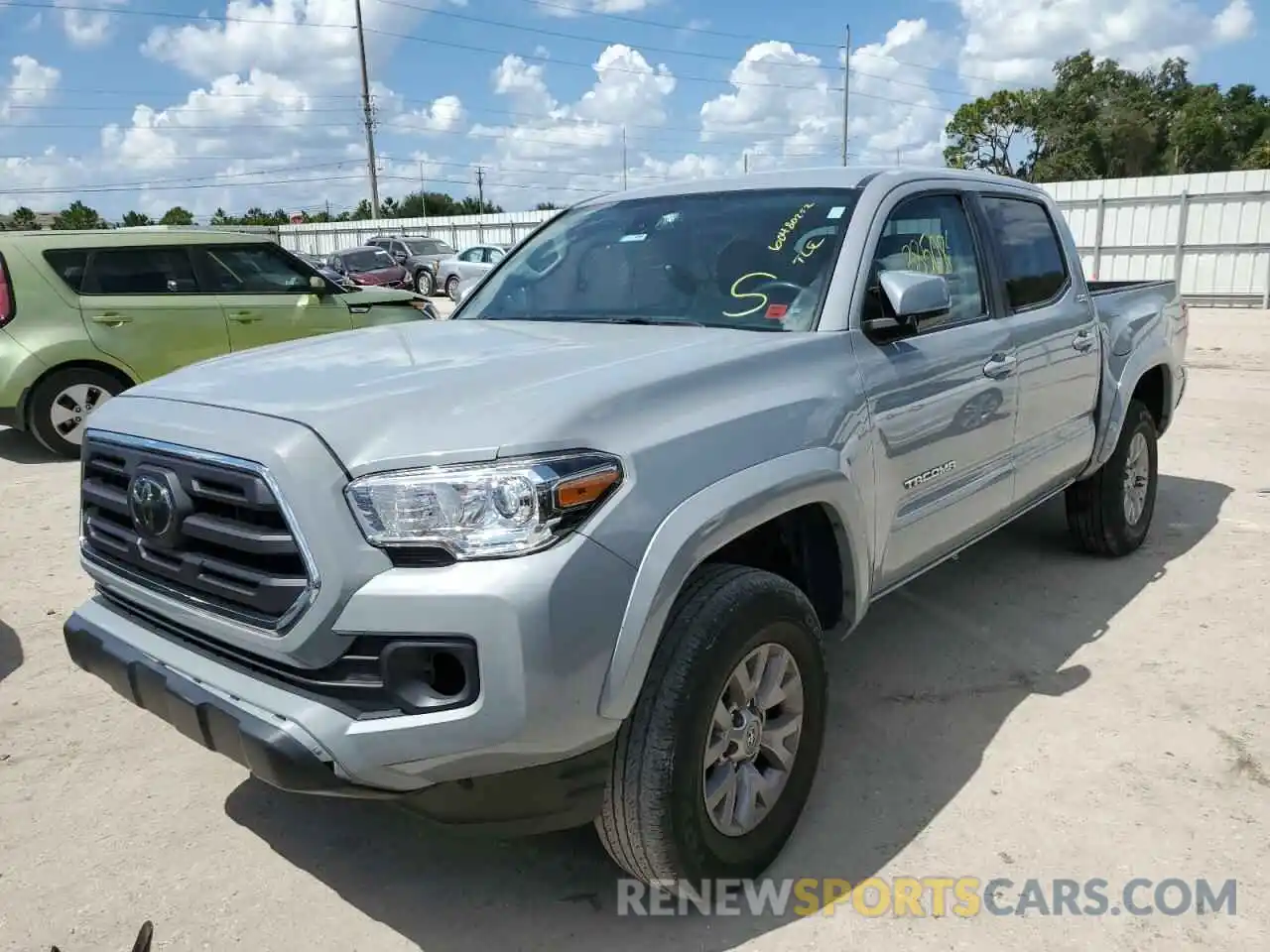 2 Photograph of a damaged car 3TMAZ5CN5KM100268 TOYOTA TACOMA 2019