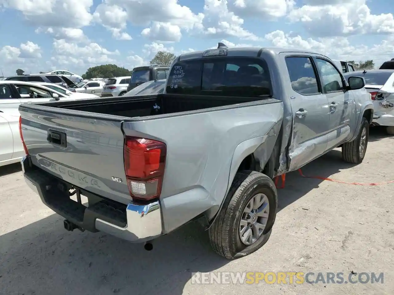 4 Photograph of a damaged car 3TMAZ5CN5KM100268 TOYOTA TACOMA 2019