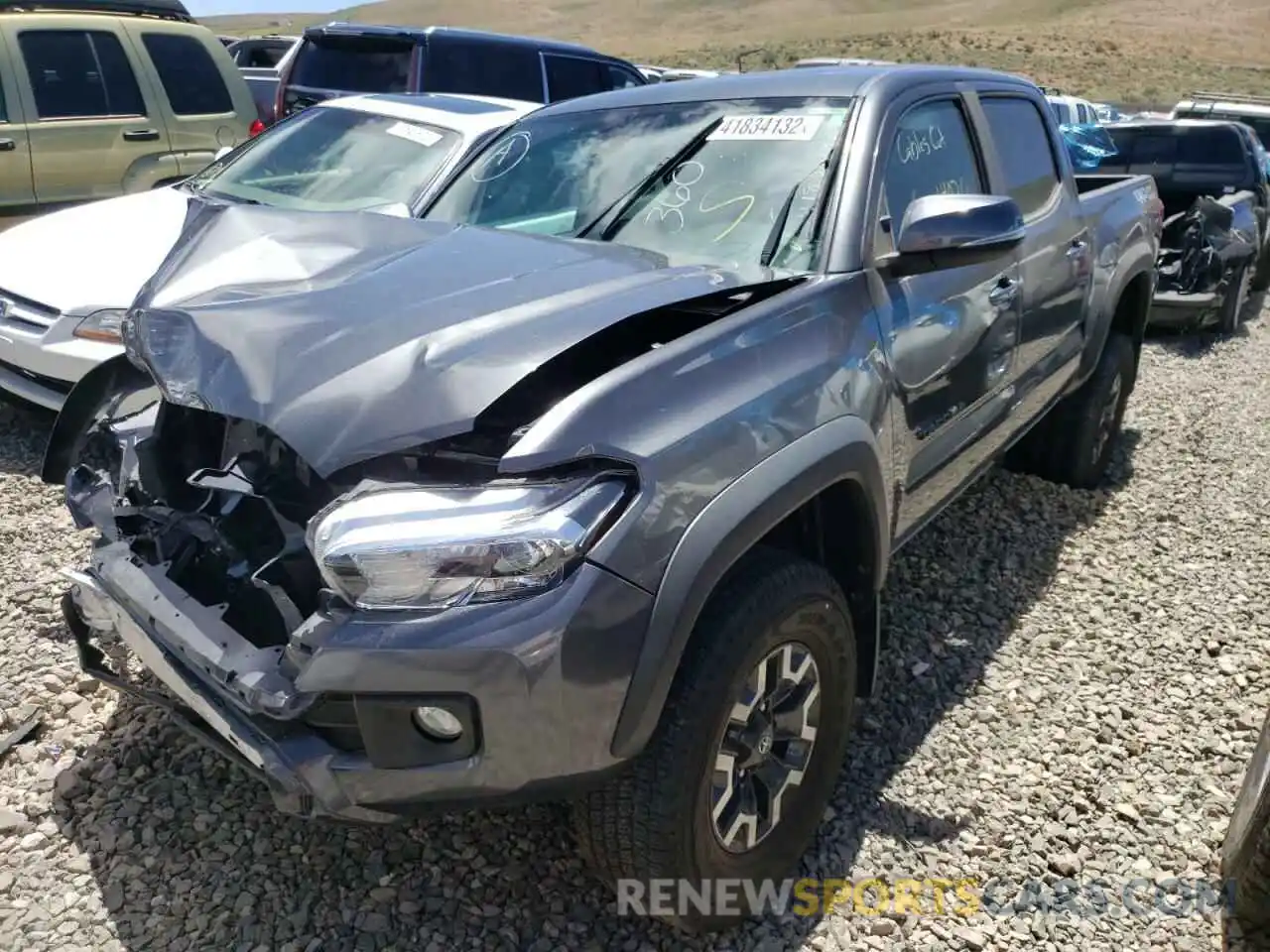 2 Photograph of a damaged car 3TMAZ5CN5KM101226 TOYOTA TACOMA 2019