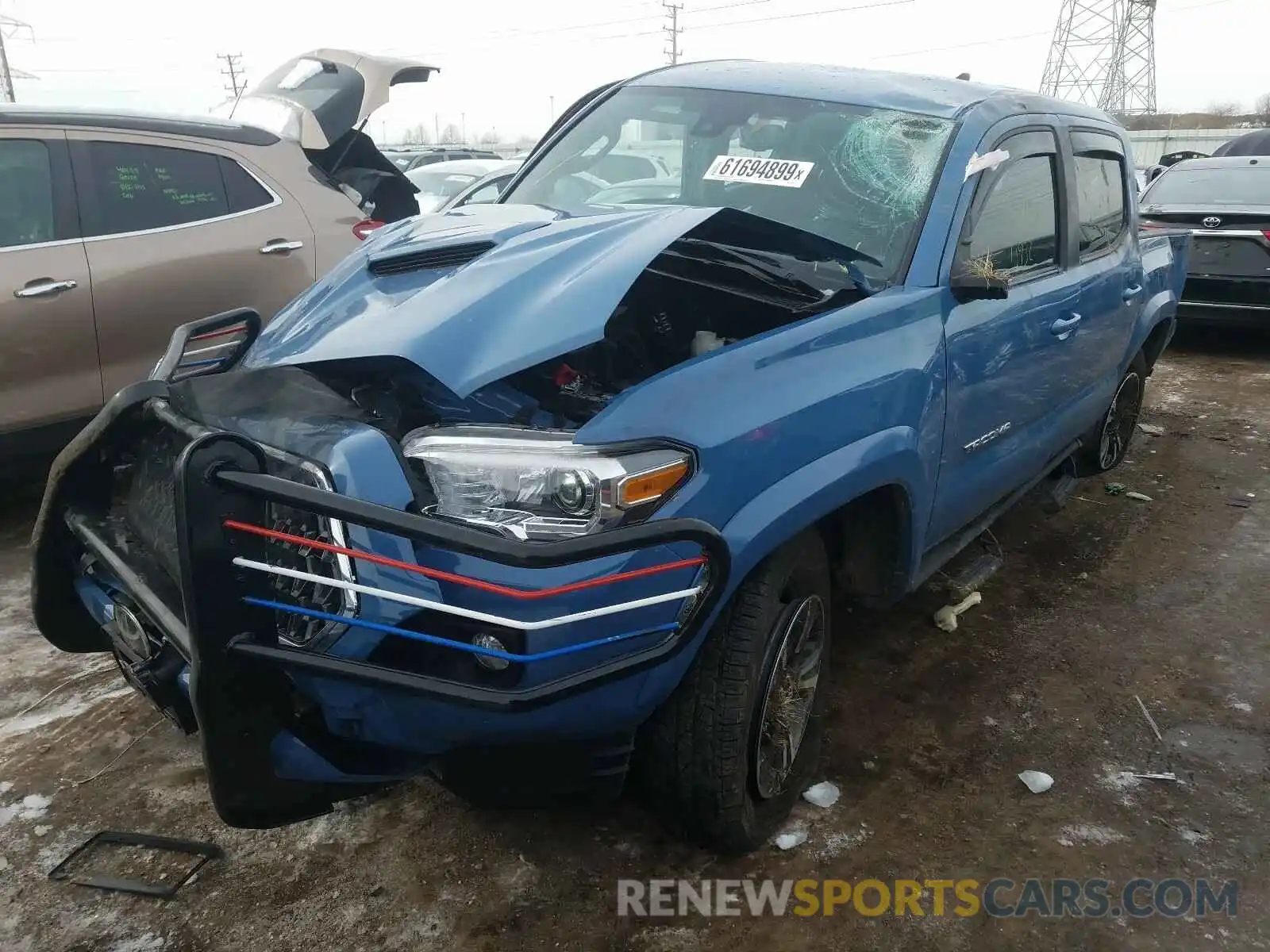 2 Photograph of a damaged car 3TMAZ5CN5KM102411 TOYOTA TACOMA 2019