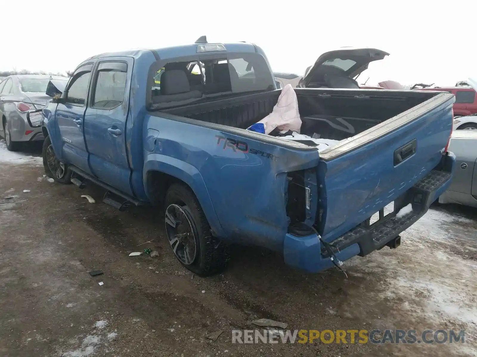 3 Photograph of a damaged car 3TMAZ5CN5KM102411 TOYOTA TACOMA 2019