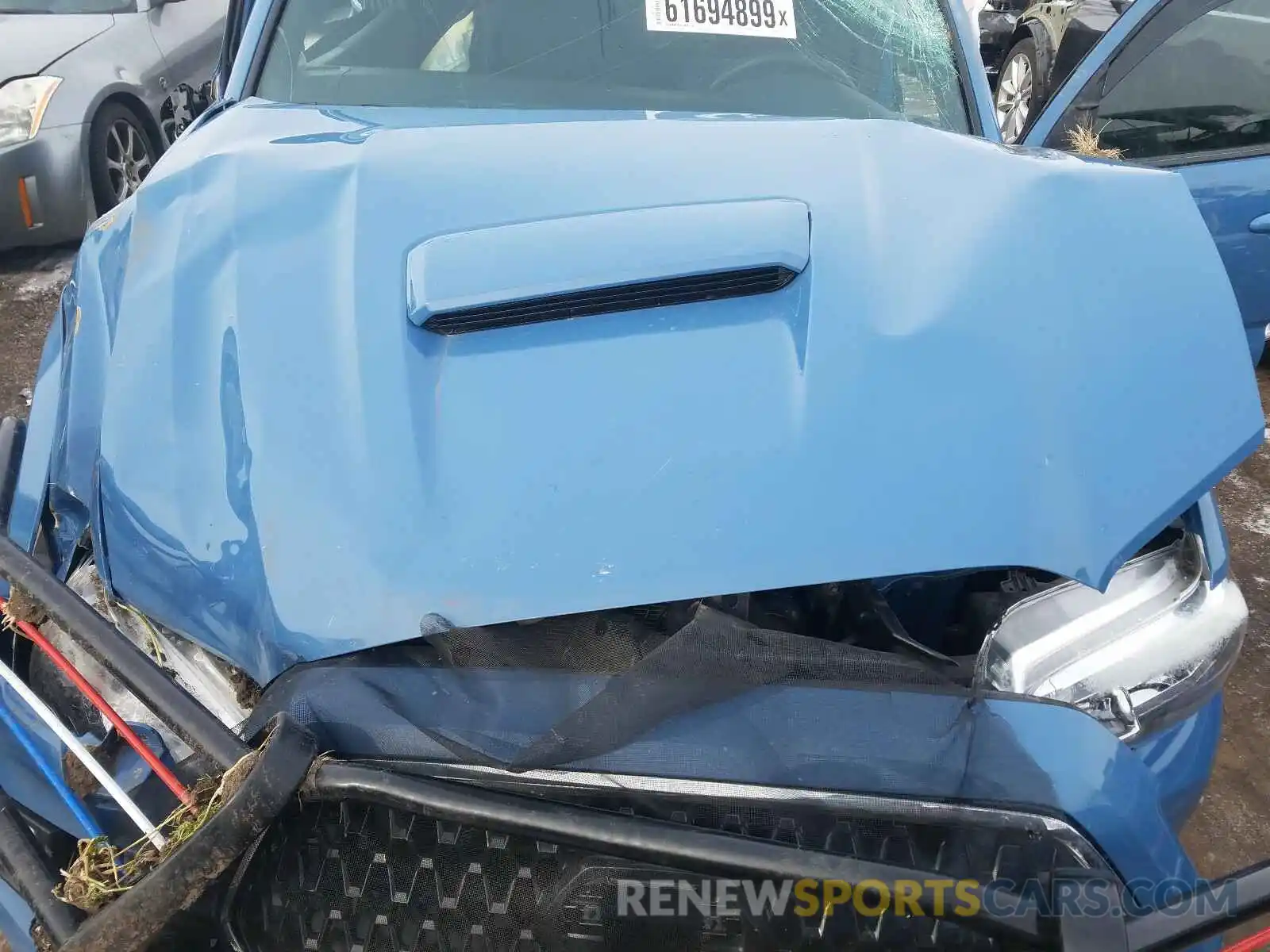 7 Photograph of a damaged car 3TMAZ5CN5KM102411 TOYOTA TACOMA 2019