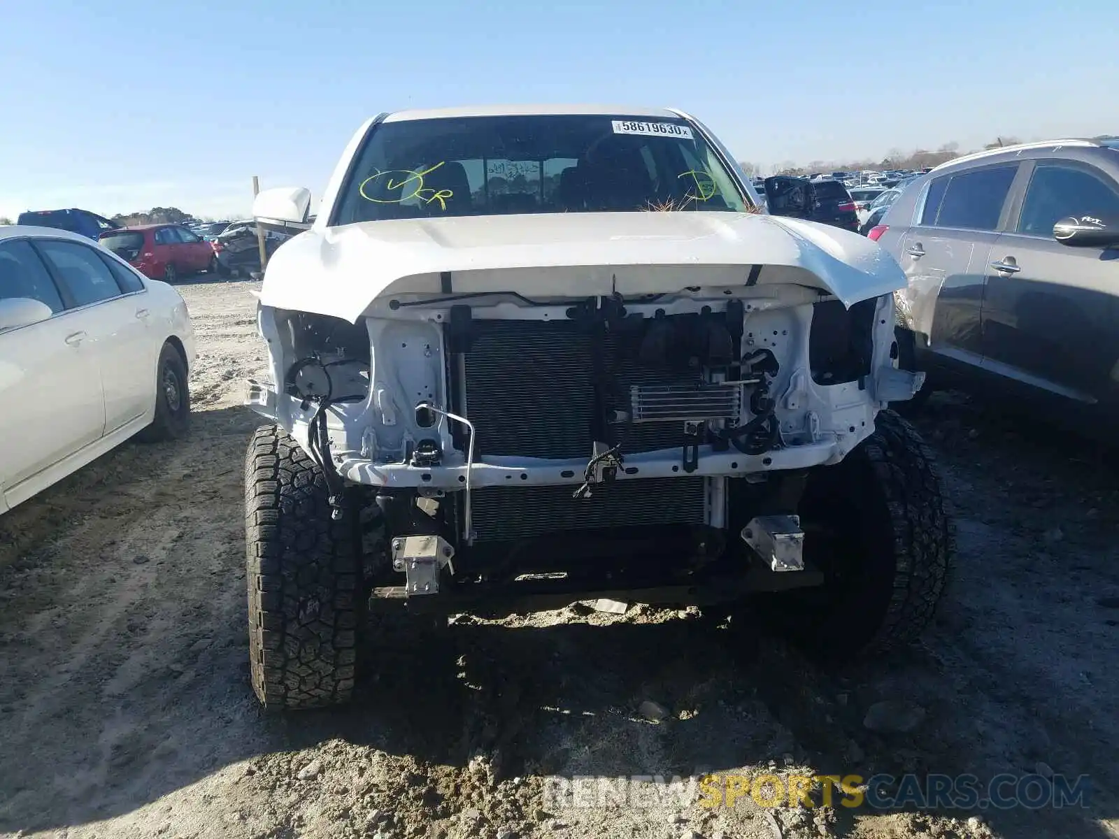 9 Photograph of a damaged car 3TMAZ5CN5KM102666 TOYOTA TACOMA 2019