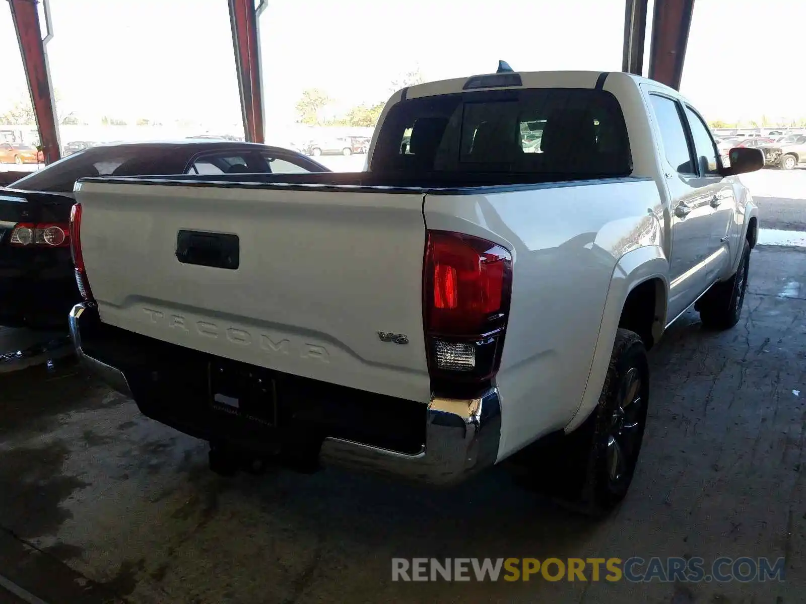 4 Photograph of a damaged car 3TMAZ5CN5KM102943 TOYOTA TACOMA 2019