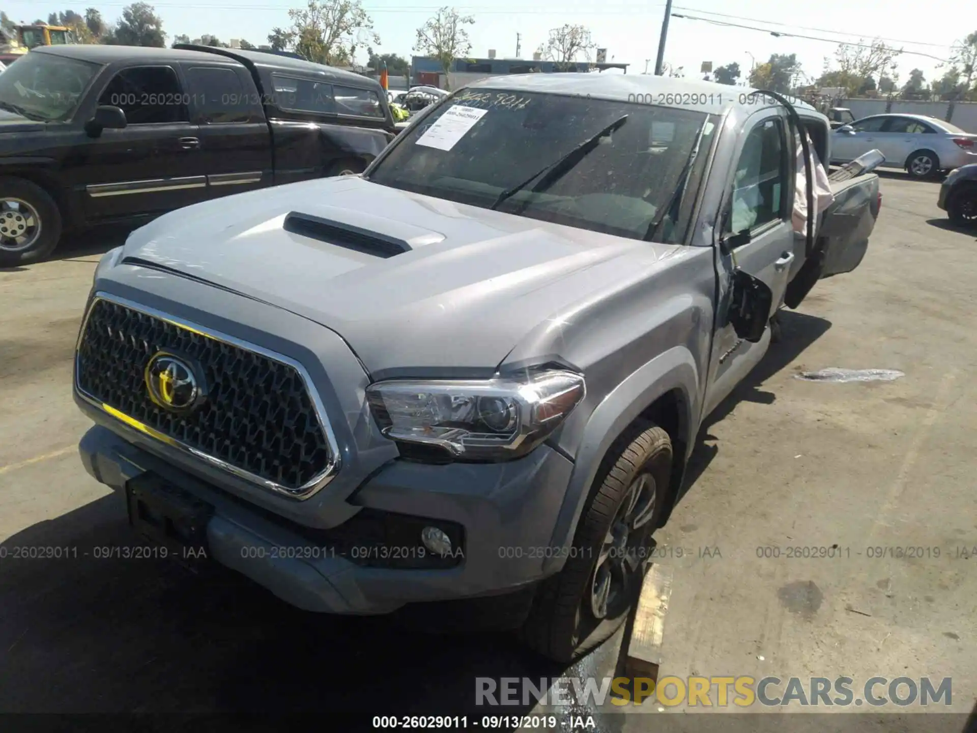 2 Photograph of a damaged car 3TMAZ5CN5KM104997 TOYOTA TACOMA 2019