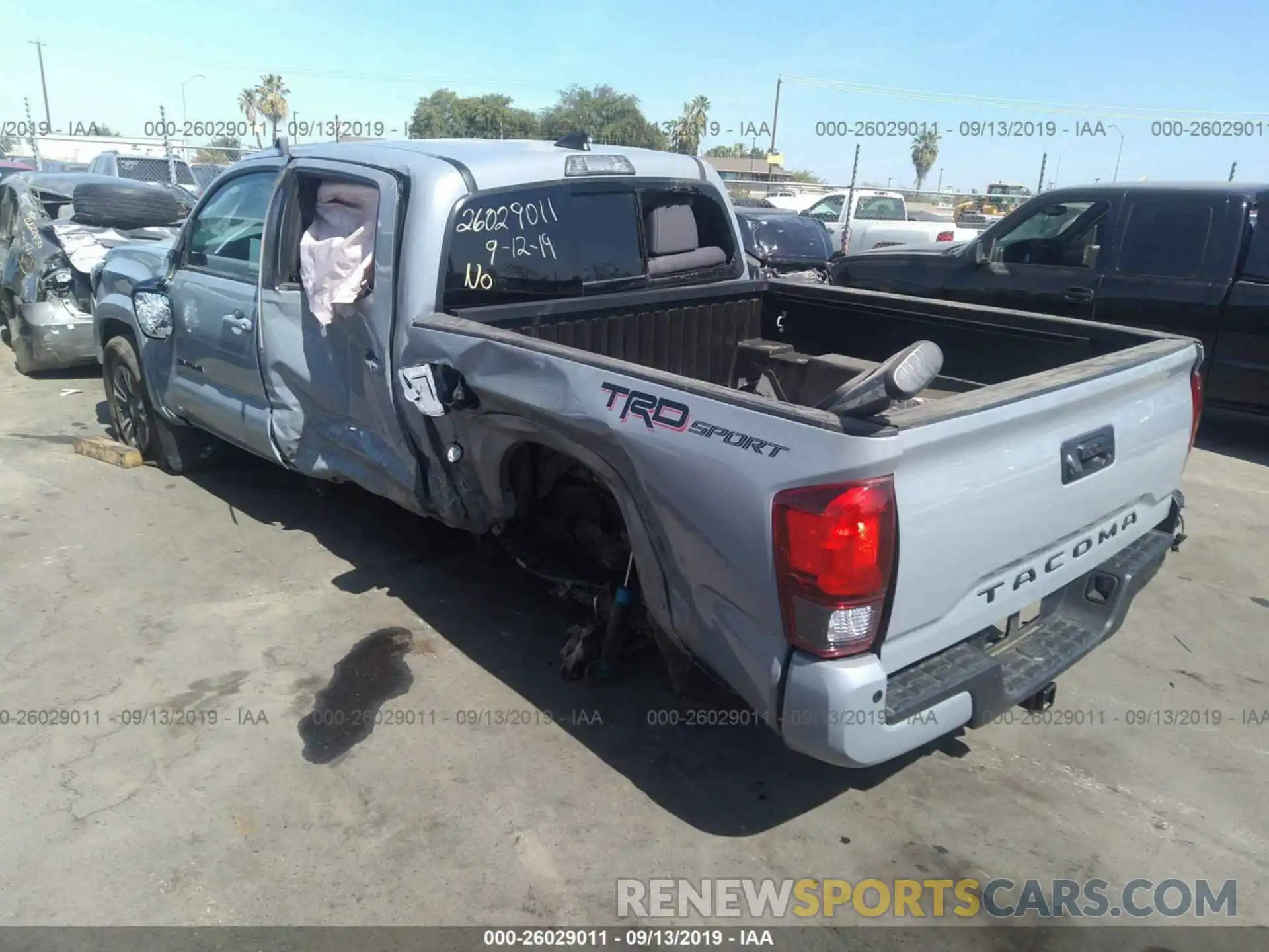 3 Photograph of a damaged car 3TMAZ5CN5KM104997 TOYOTA TACOMA 2019