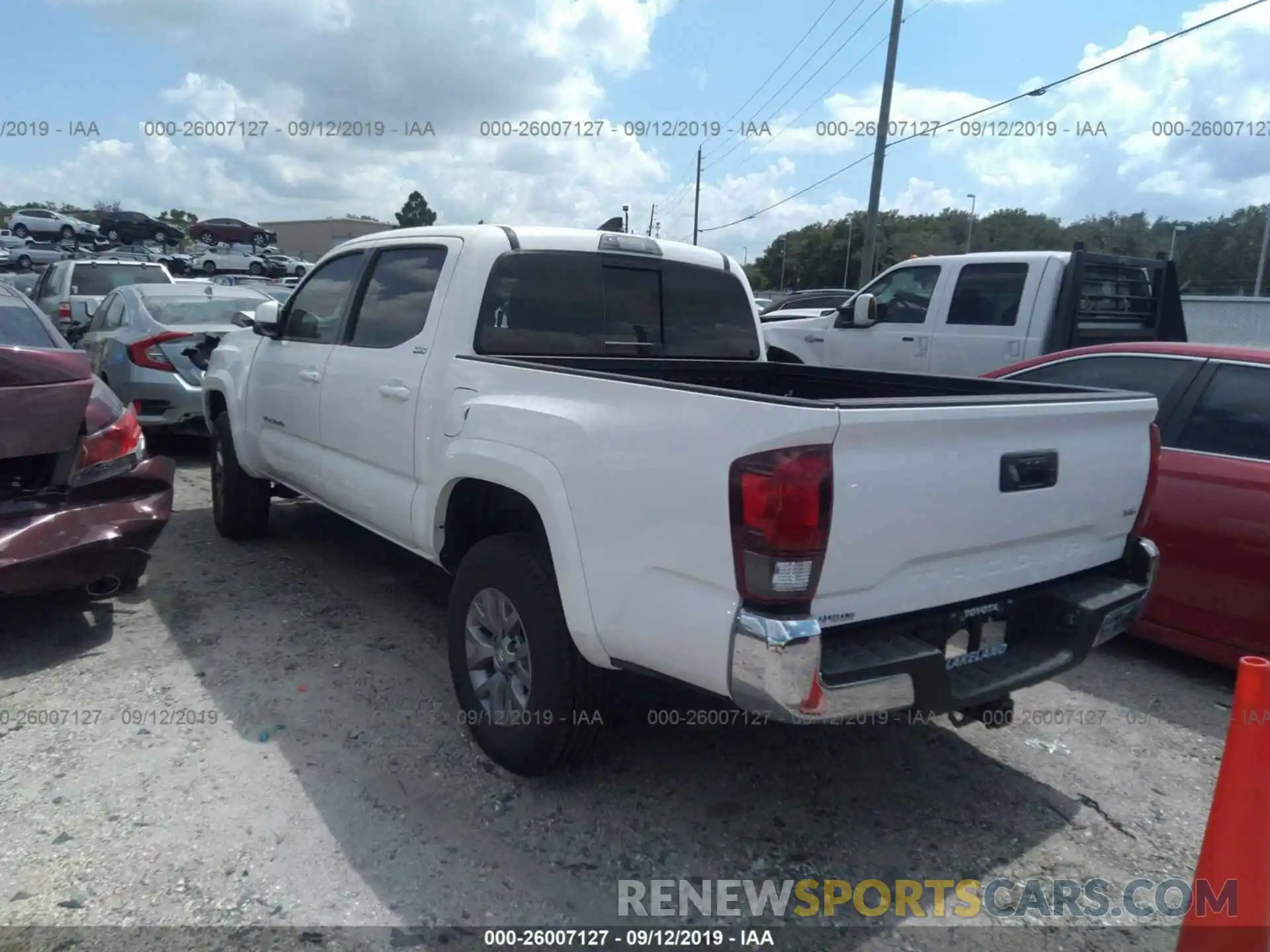 3 Photograph of a damaged car 3TMAZ5CN5KM106992 TOYOTA TACOMA 2019