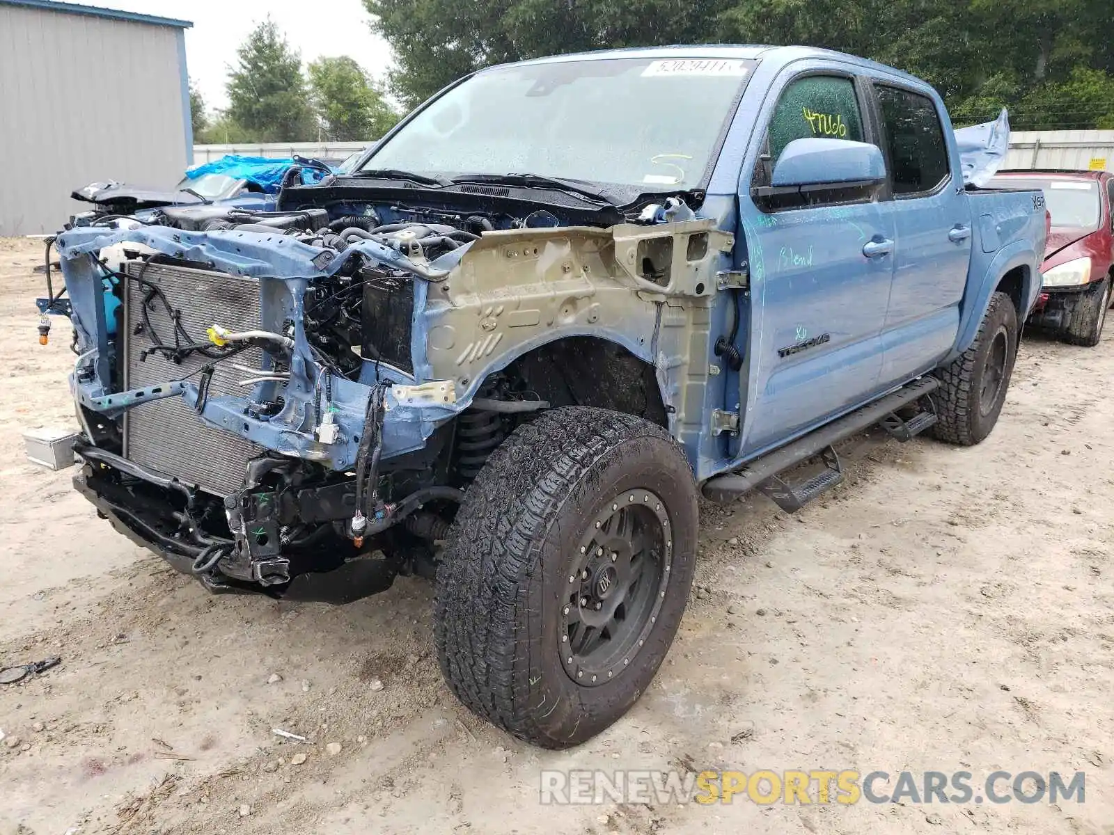 2 Photograph of a damaged car 3TMAZ5CN5KM107611 TOYOTA TACOMA 2019