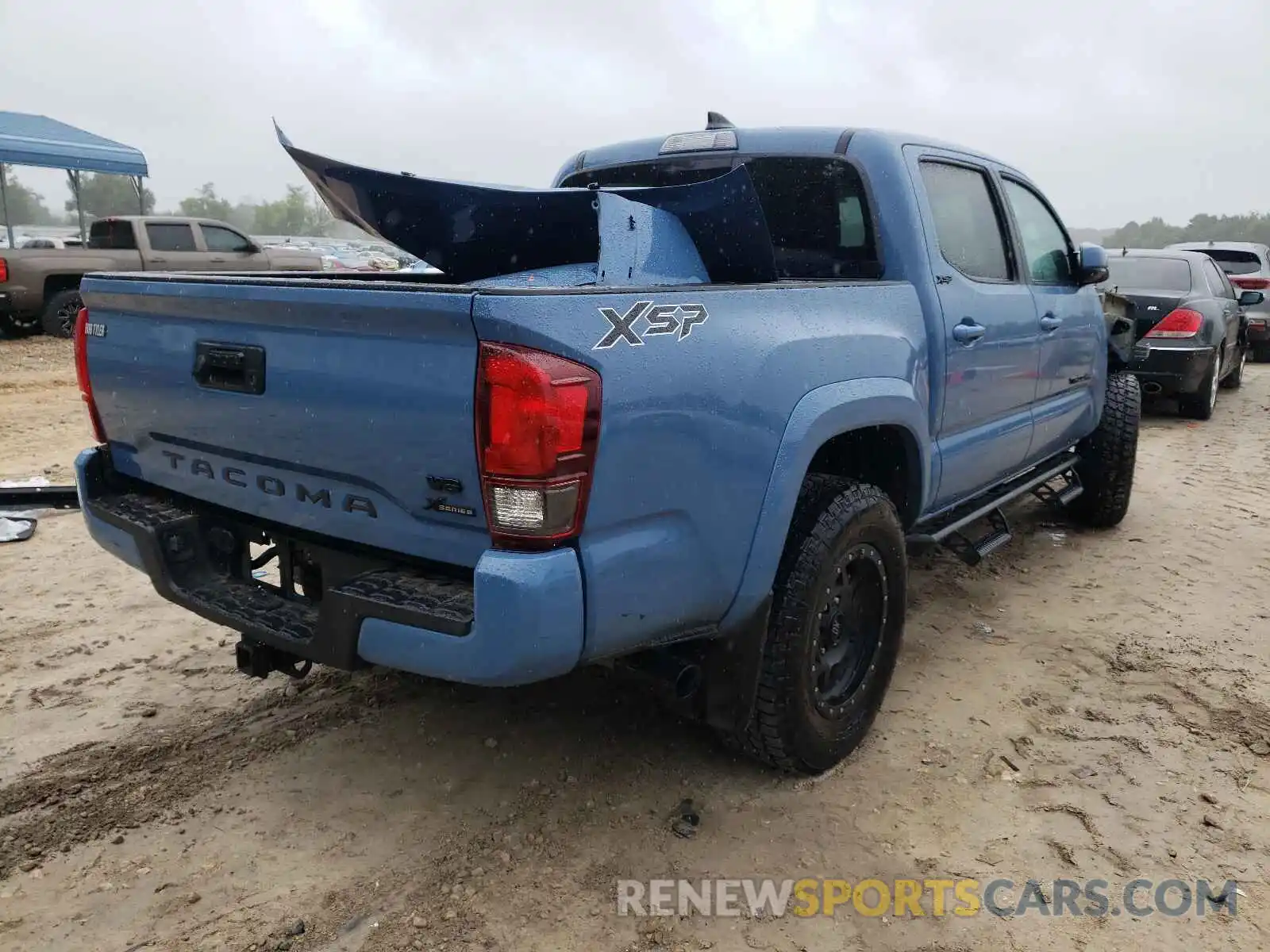 4 Photograph of a damaged car 3TMAZ5CN5KM107611 TOYOTA TACOMA 2019