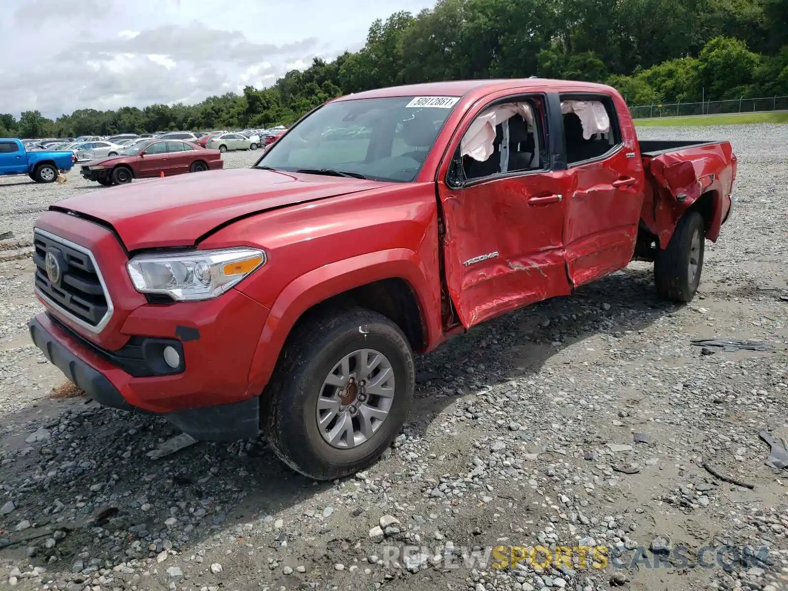 2 Photograph of a damaged car 3TMAZ5CN5KM112811 TOYOTA TACOMA 2019