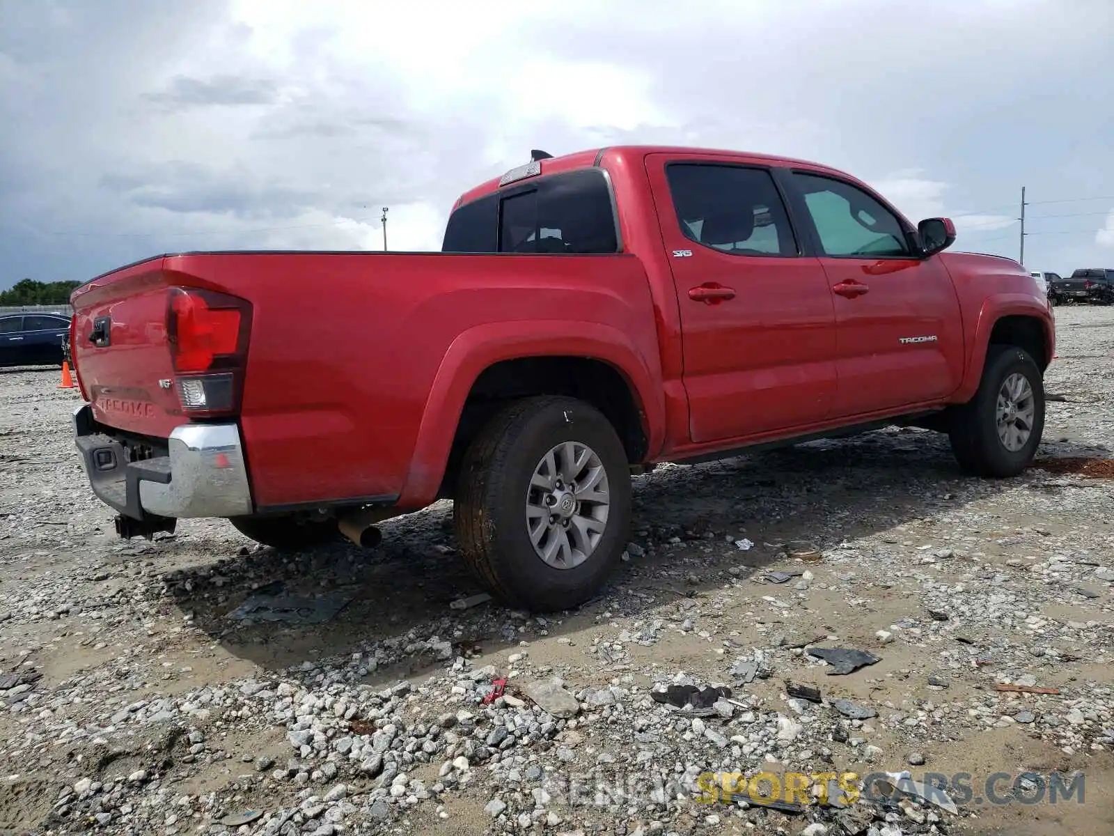 4 Photograph of a damaged car 3TMAZ5CN5KM112811 TOYOTA TACOMA 2019